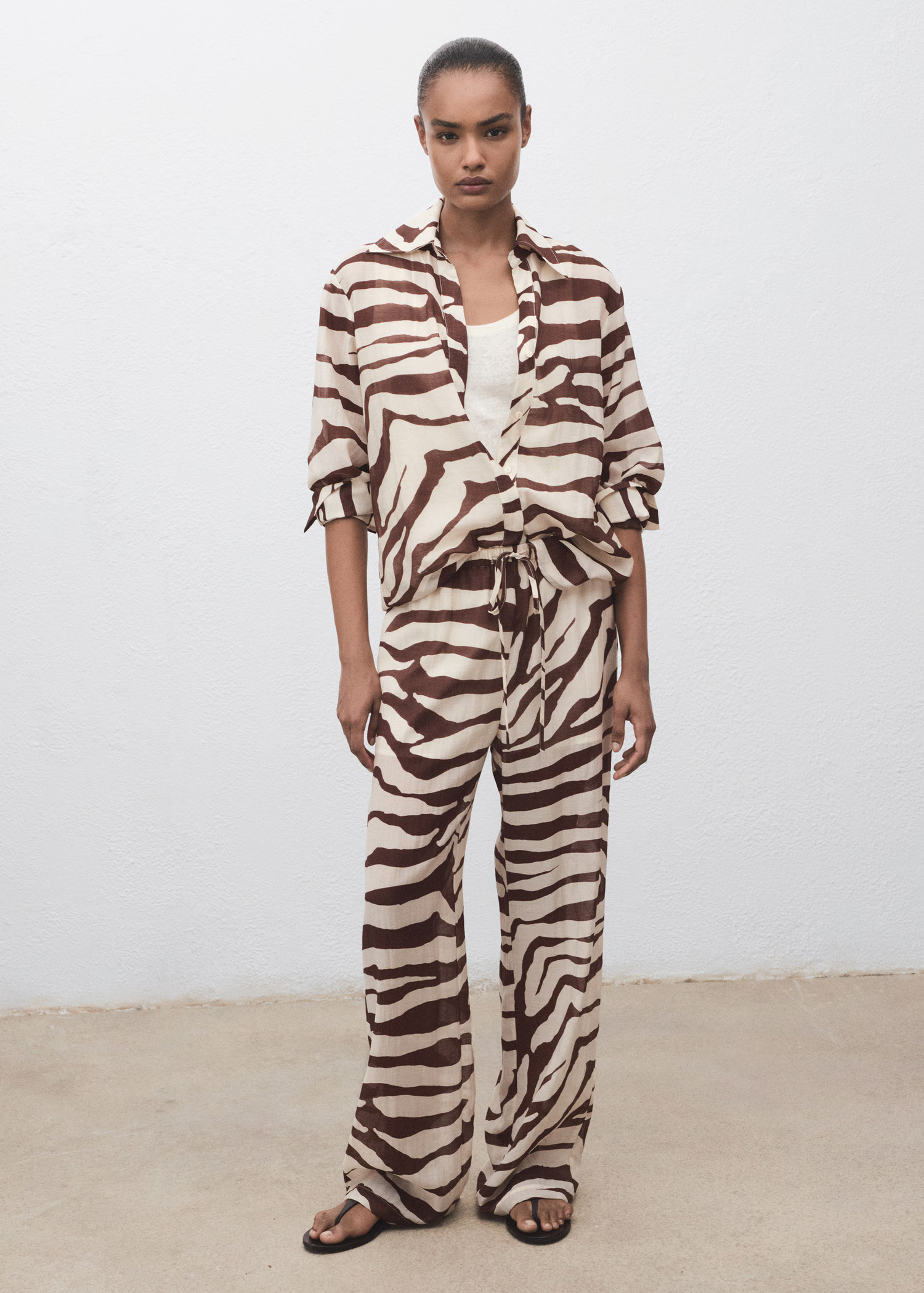 Zebra-print fluid trousers - Women | MANGO United Kingdom | MANGO (UK)