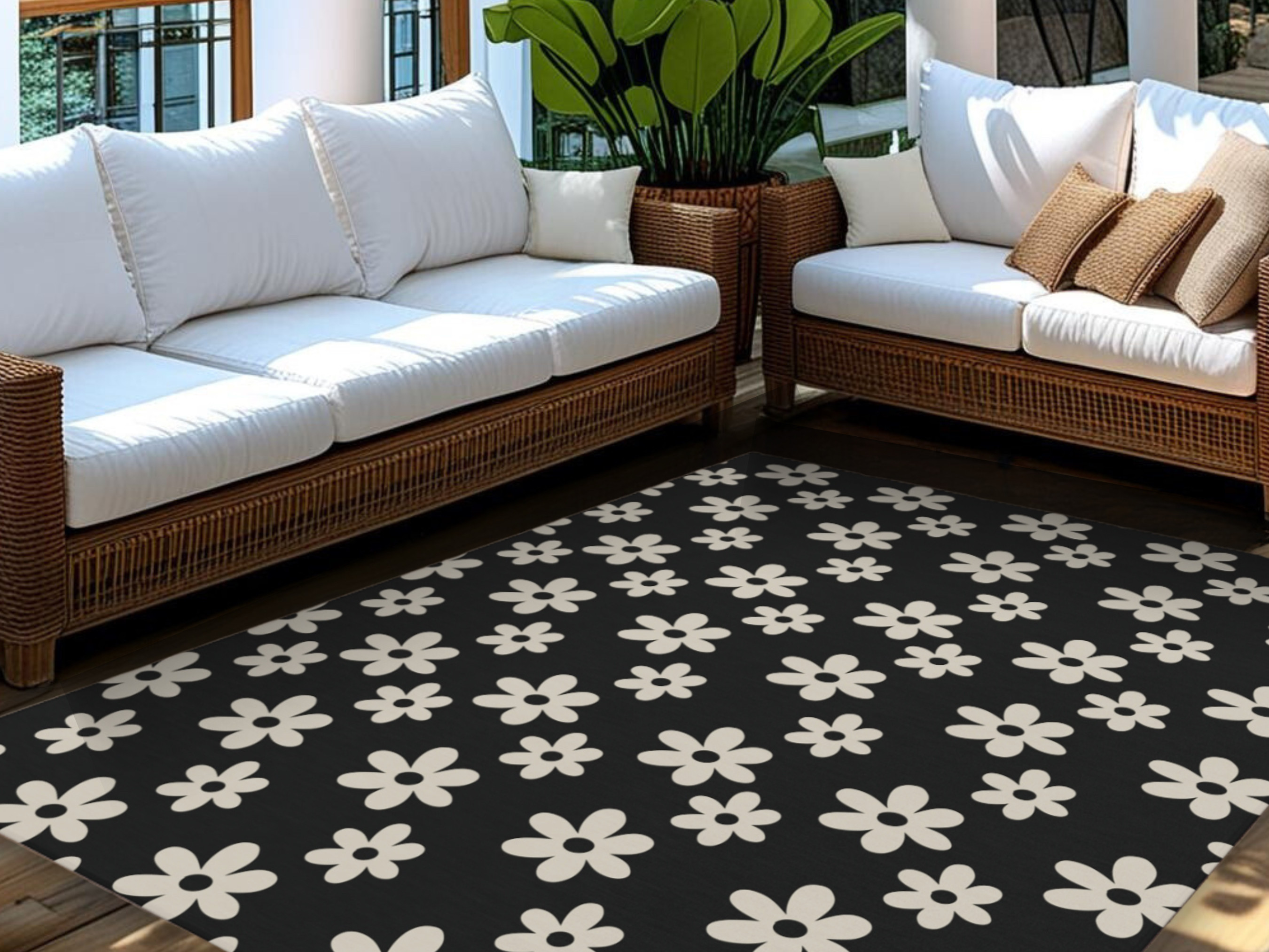Modern Farmhouse Black and White Daisy Rug 
.
Nothing beats daisies - especially in a rug! Use this rug for your outdoor or indoor spaces! 

 #LTKspring #LTKsummer #LTKstyletip