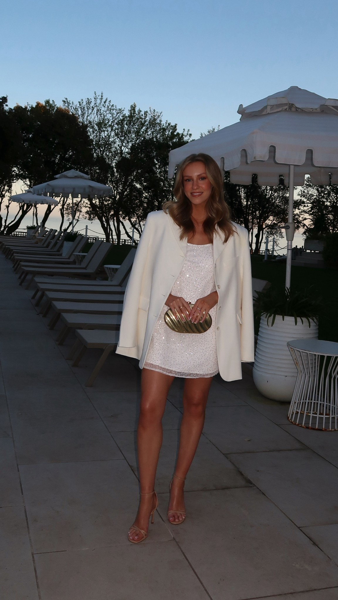 Holiday outfit, Ibiza outfits, hen do outfit, white sequin mini dress, Abercrombie, cream blazer, gold clutch, nude heel sandals 

#LTKsummer #LTKAroundTheWorld #LTKdresses