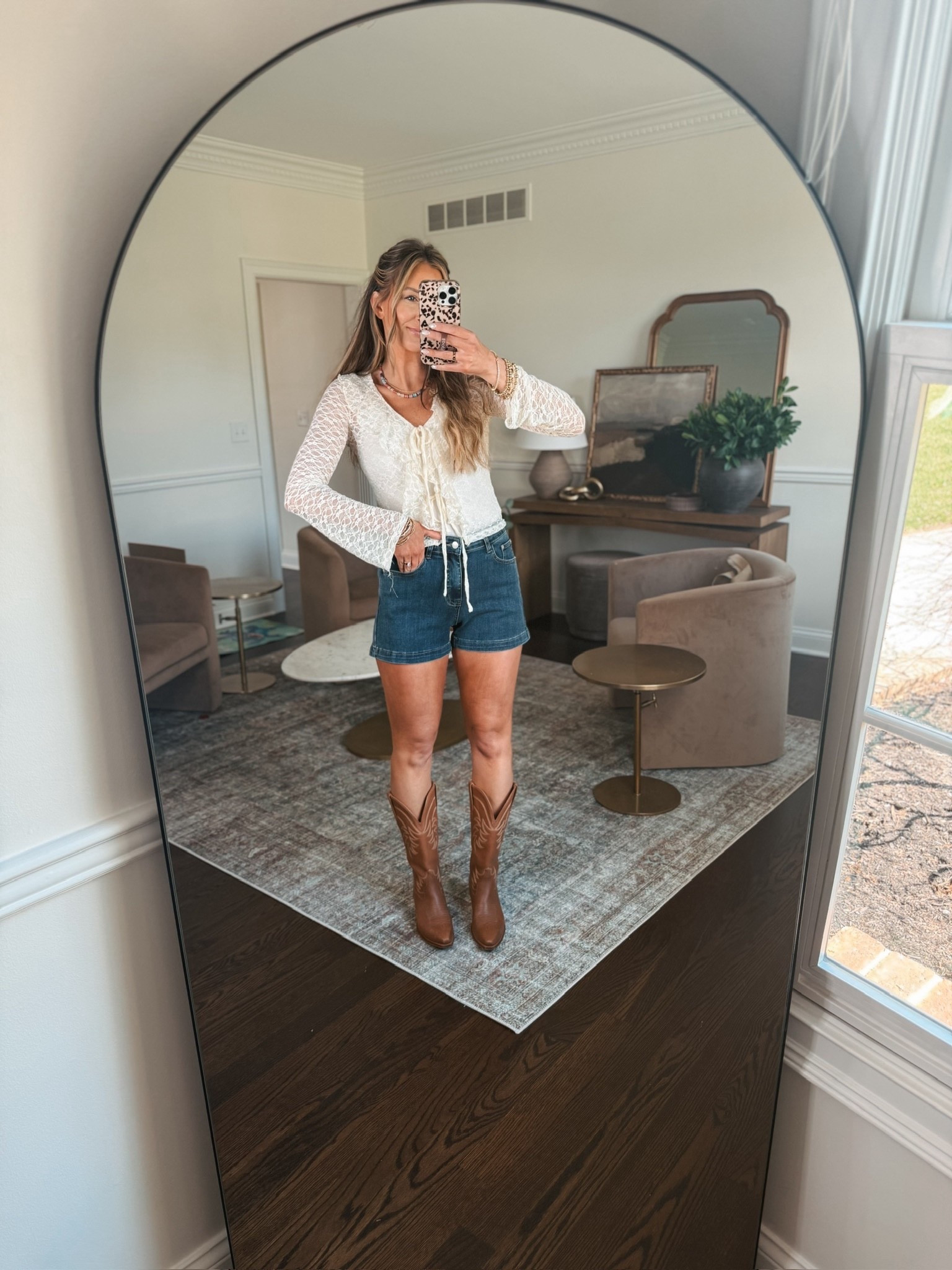 The cutest country concert outfit from apink Lily. This lace top with the ruffle collar is SO cute and the stretch jean shorts are so comfy. 

#LTKTravel #LTKootd #LTKFestival