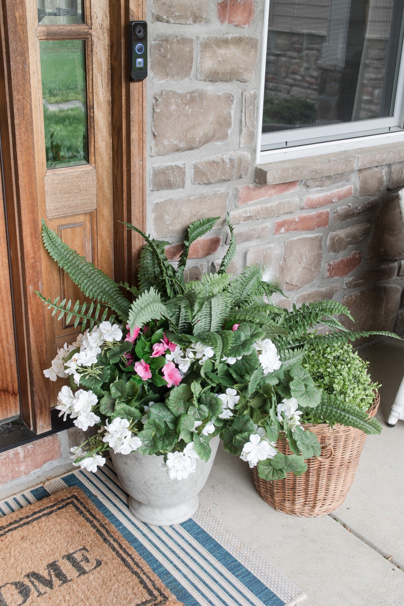 Faux plants and flowers at the front door 

#LTKFindsUnder50 #LTKSeasonal #LTKHome