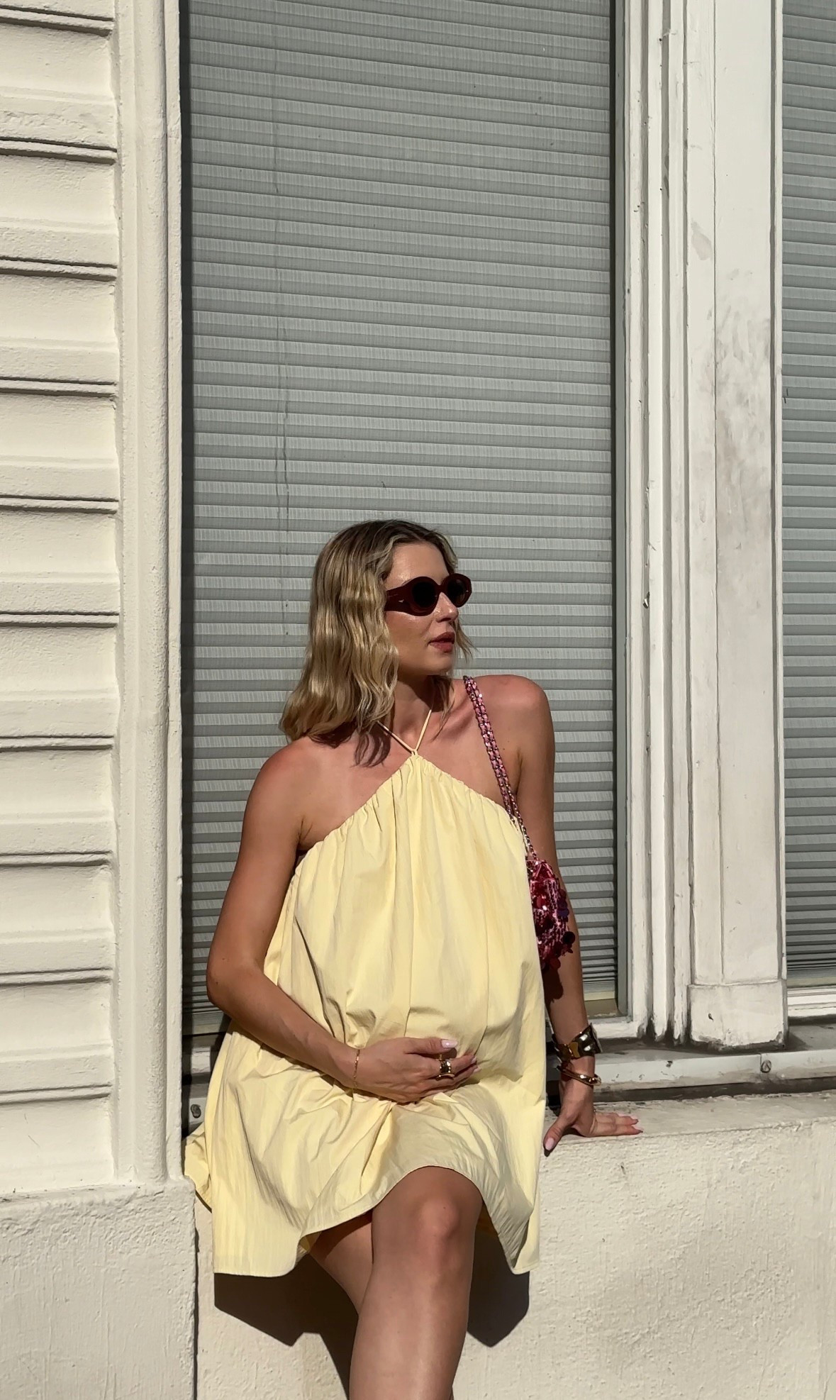 Open back butter yellow summer neck holder dress. Perfect for the bump! 

#LTKItBag #LTKStyleTip #LTKBump