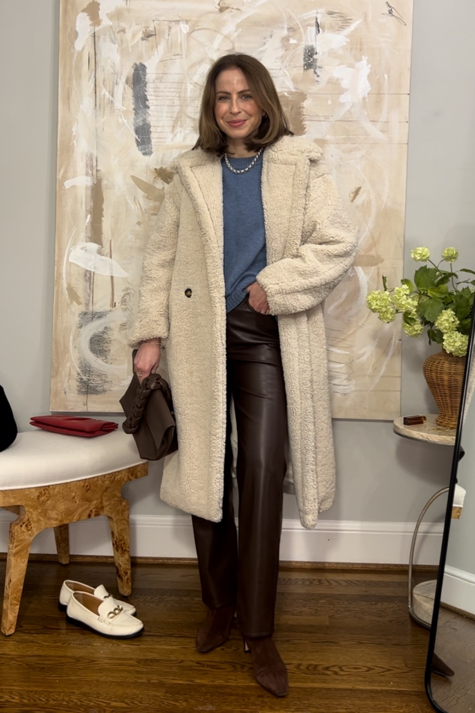 Chocolate brown faux leather pants 
Sherpa coat apparis
Blue sweater Sezane
Ankle boots STAUD 
Demellier bag old
Jenny bird silver necklace


#LTKstyletip