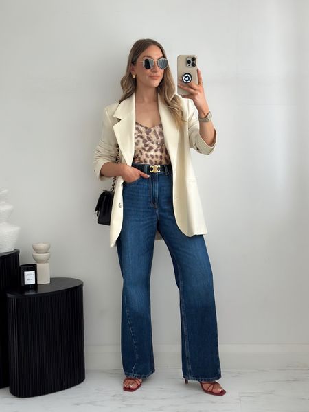Dressing up jeans with an ivory blazer & a leopard body.

Blazer is old Seleted femme
Body is Zara (code: 5039/494)
Jeans: size 8
Sandals: Next



#LTKfindsunder100 #LTKstyletip #LTKshoecrush