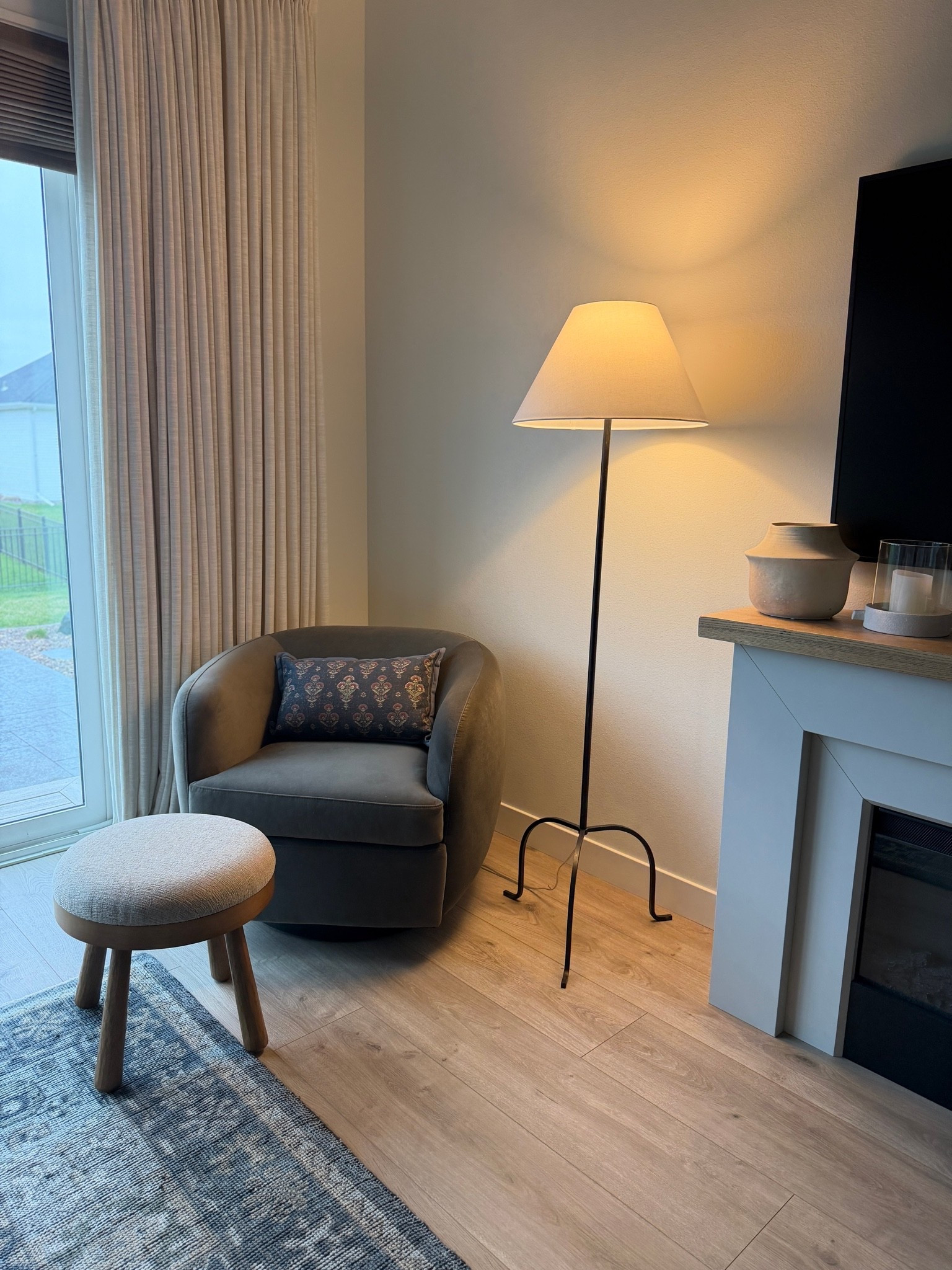Our wrought-iron floor lamp is finally on sale! I love the tripod curved base.

#LTKHome #LTKSaleAlert