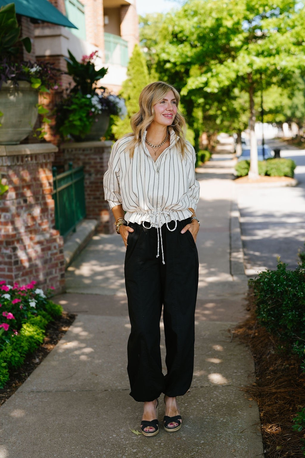 A classic transitional look with a little something extra. The striped tie-front blouse adds an effortless touch to these black wide-leg pants, while platform sandals keep the look comfortable and elevated. Finished with simple gold jewelry for an easy, pulled-together feel. Everything is linked below!

#LTKgrwm #LTKdayinmylife #LTKootd