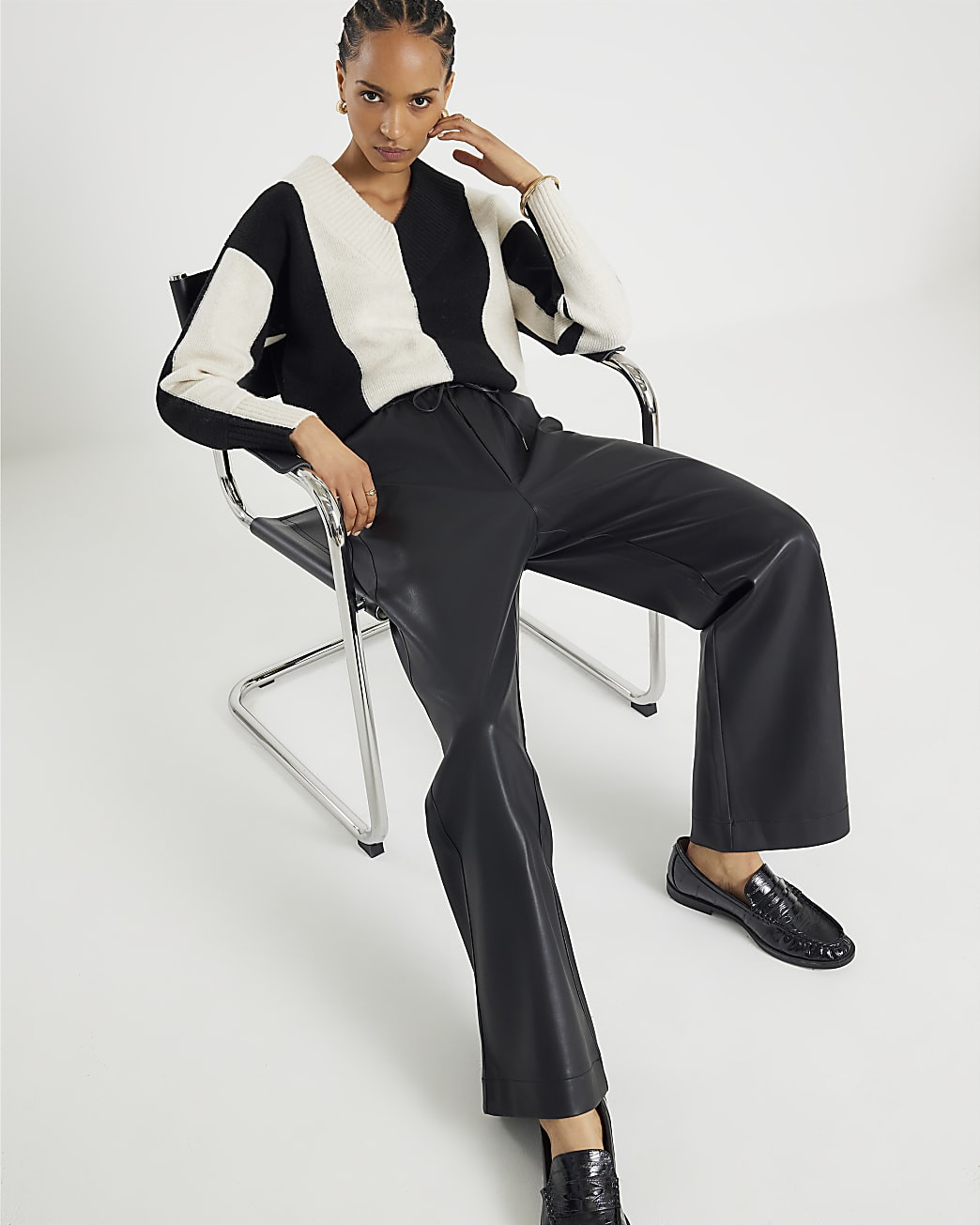 Black Faux Leather Elasticated Waist Trousers | River Island UK & IE