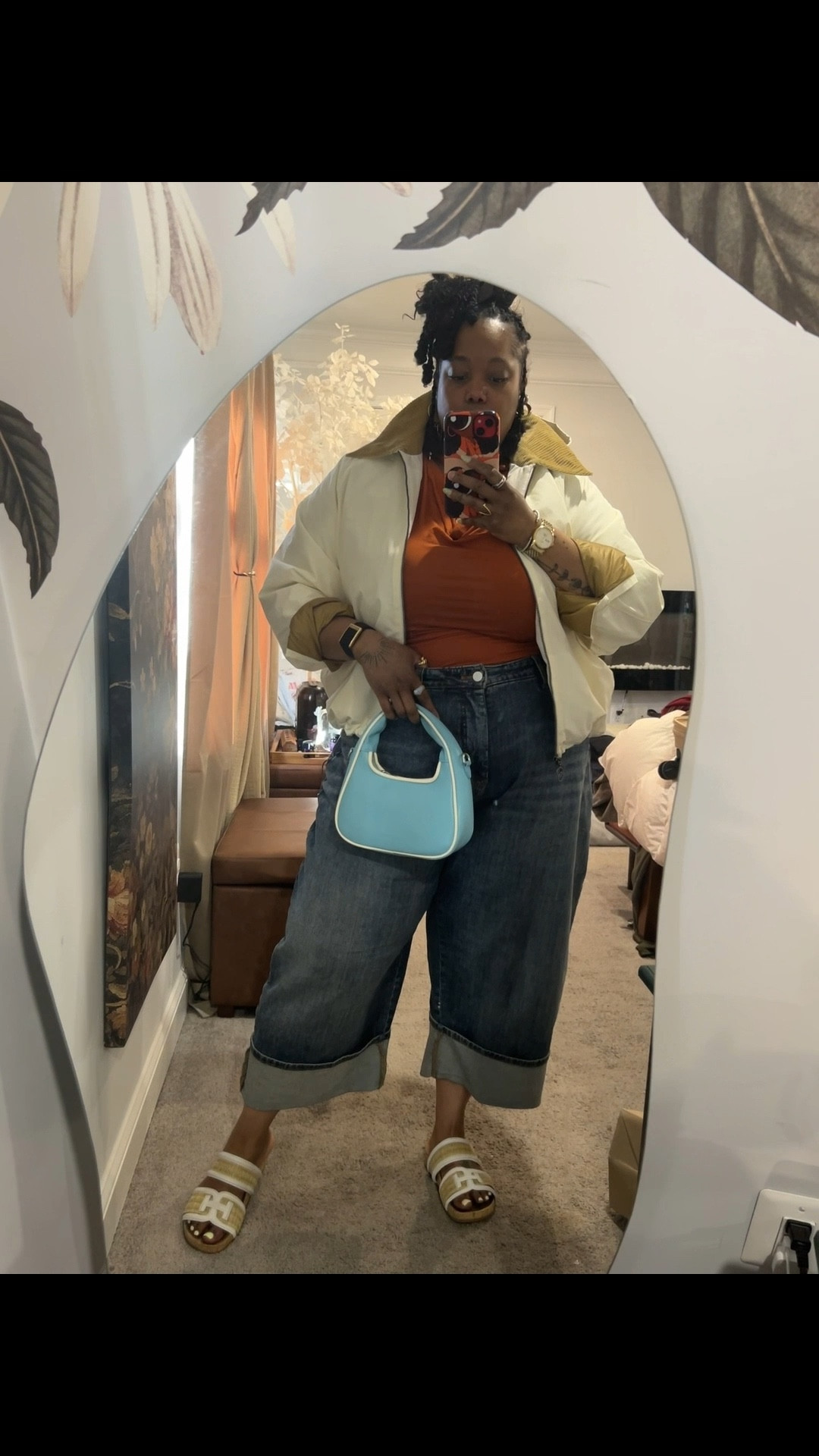 A little color goes a long way. 
This draped rust top instantly warms up the whole look and pairs perfectly with relaxed denim. Add a fun pop bag and suddenly it’s giving art gallery stroll or solo brunch date energy.

#LTKootd #LTKgrwm #LTKOver40