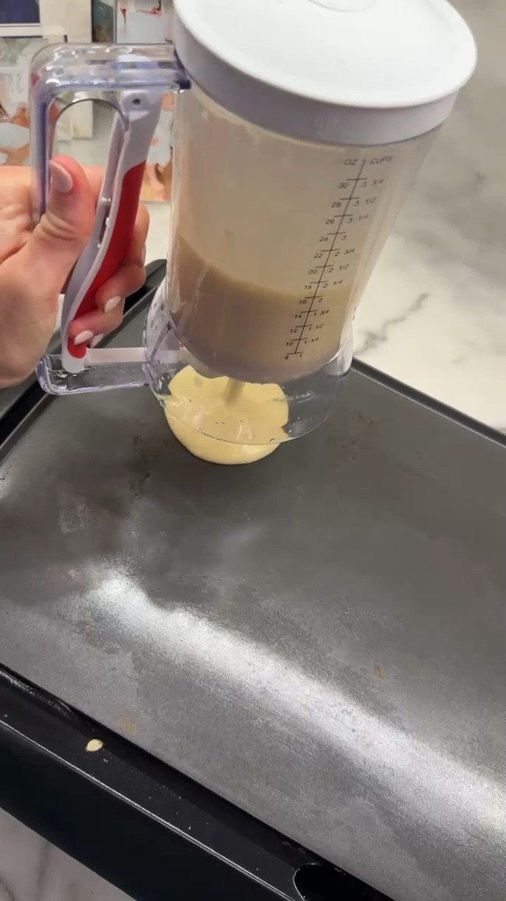 How amazing is this!? This is a household staple for me!
My kids love pancakes and I struggled using so many dishes and making a big mess! 🤣

I absolutely LOVE this pancake batter dispenser from Amazon!

You mix the batter inside the dispenser and use it when you are ready!😍

Kitchen hacks, best kitchen gadgets, must have kitchen gadgets, kitchen life hacks👩🏼‍🍳