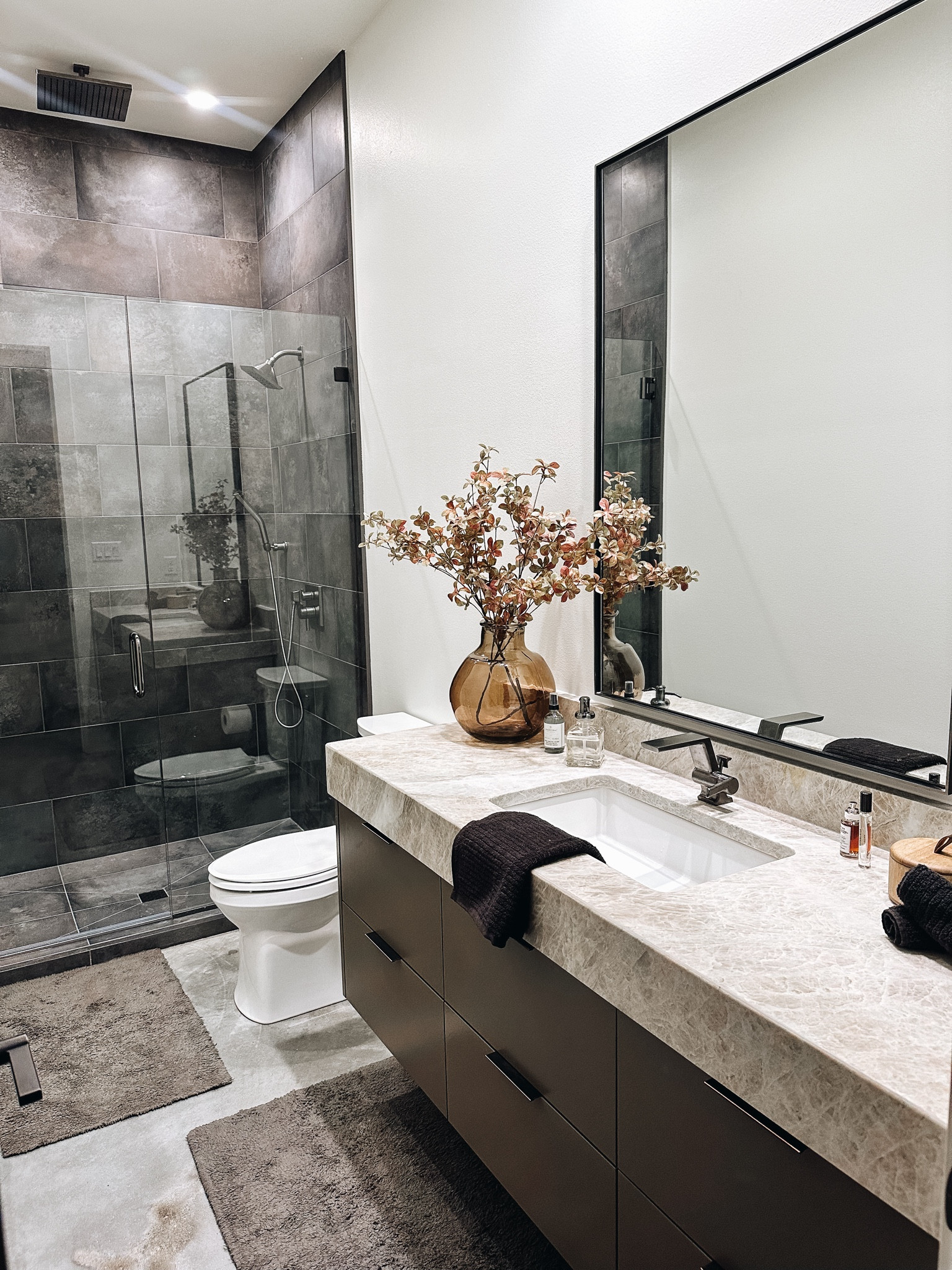 Obsessed with how the guest bathroom in our new addition turned out. From the Black Patina floor to ceiling shower tile to the Taj Mahal Quartzite countertops, all tied in with paint grade cabinets and door in the Sherwin-Williams shade: Griffin. 

Once it was complete, I happily took myself to Target to gather the essentials and a few decor pieces linked! 

Target | Target Style | Guest Bathroom | Guest Bathroom Decor | Bathroom Decor | Restoration Hardware | Bathroom Rugs | Hand Towels | Bath Towels | Sherwin-Williams | Paint Grade Cabinets | Taj Mahal Quartzite | Black Tile 


#LTKsalealert #LTKSeasonal #LTKhome