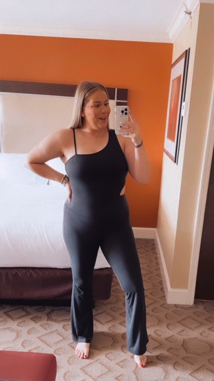 Love this flare jumpsuit from Target. Comes in 3 colors!! 
I’m wearing an XL and the length is perfect. (I am 5’9)

#LTKmidsize #LTKfitness #LTKfindsunder50