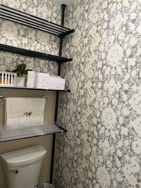 This is the easiest wallpaper to install- just peel and stick. The over the toilet storage shelves are perfect when organizing a bathroom. 

#LTKstyletip #LTKsalealert #LTKhome