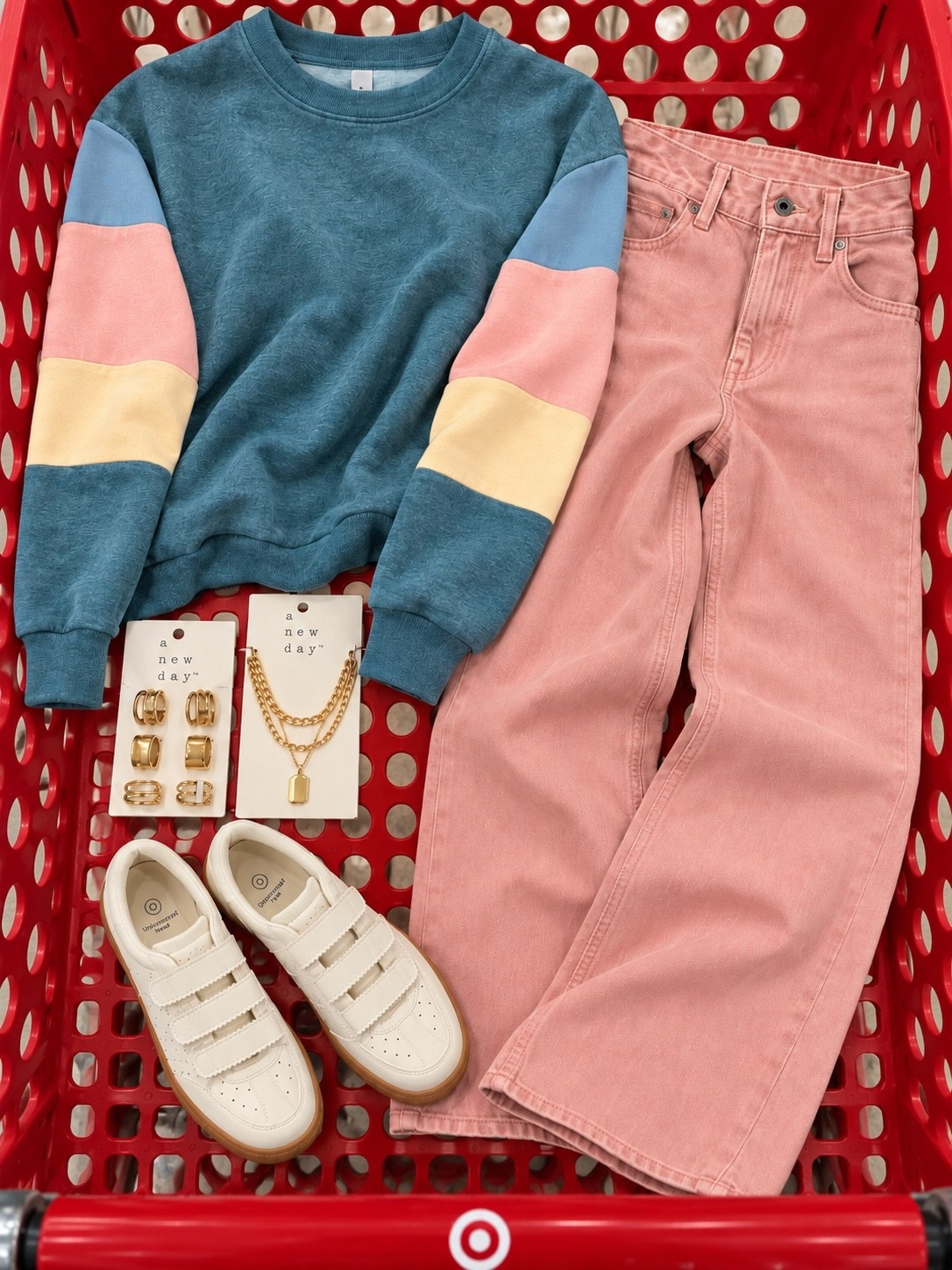 This color combo is SO fun. The teal + blush sweatshirt with pink denim feels playful without looking too young, and those cream sneakers + gold jewelry pull it all together. ✨

#LTKgrwm #LTKootd #LTKmomlife