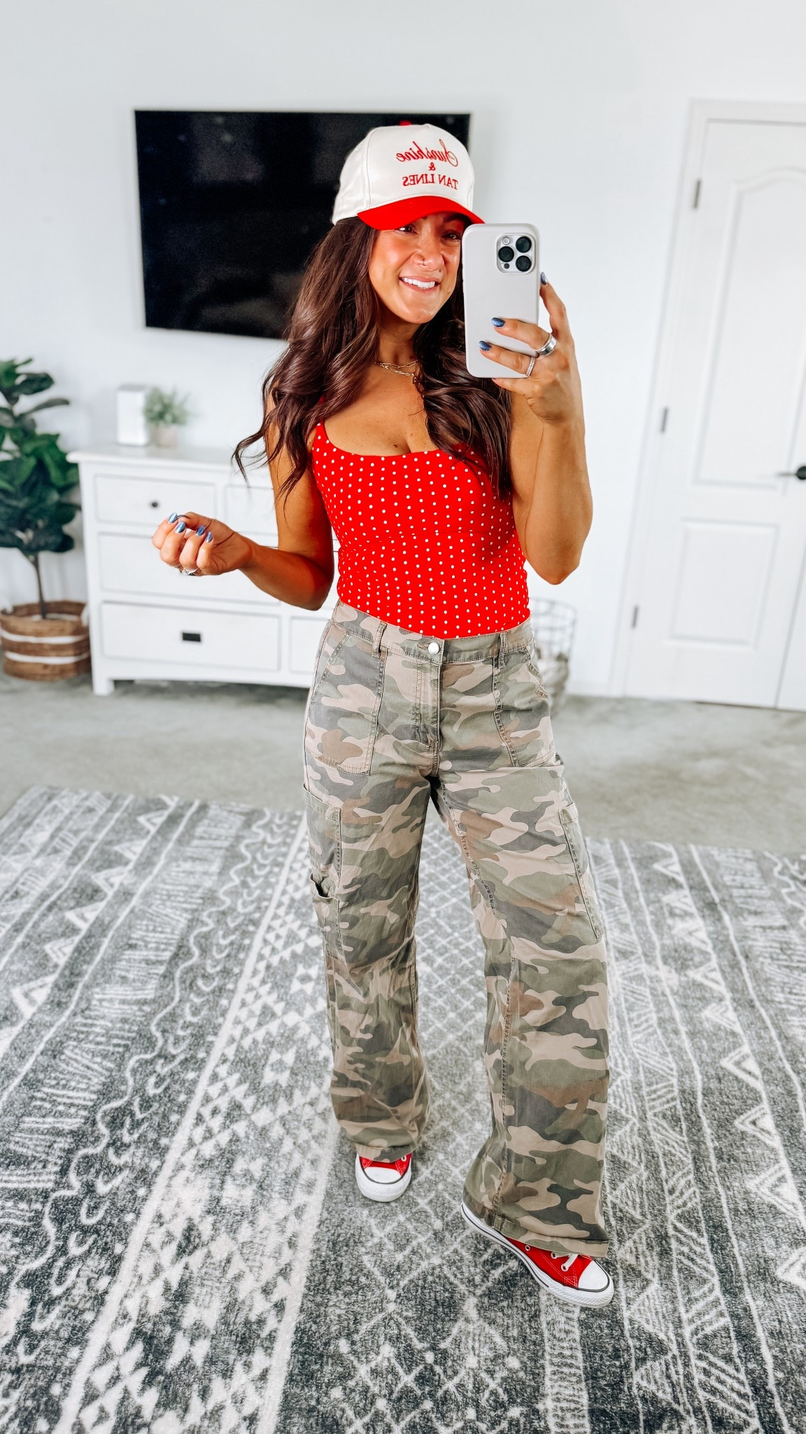 Spring sale price on this tank top!! So soft and stretchy and I love the polka dots! Size up if between. 

#LTKootd #LTKSaleAlert #LTKPetite