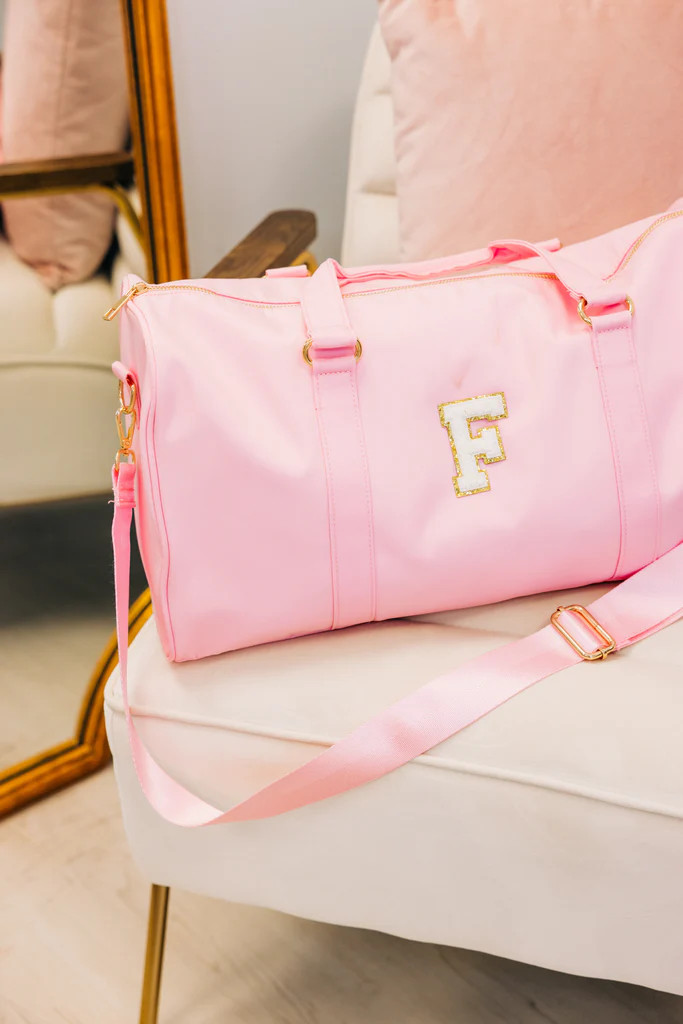 The Getaway Baby Pink Varsity Duffle Bag | The Mint Julep Boutique