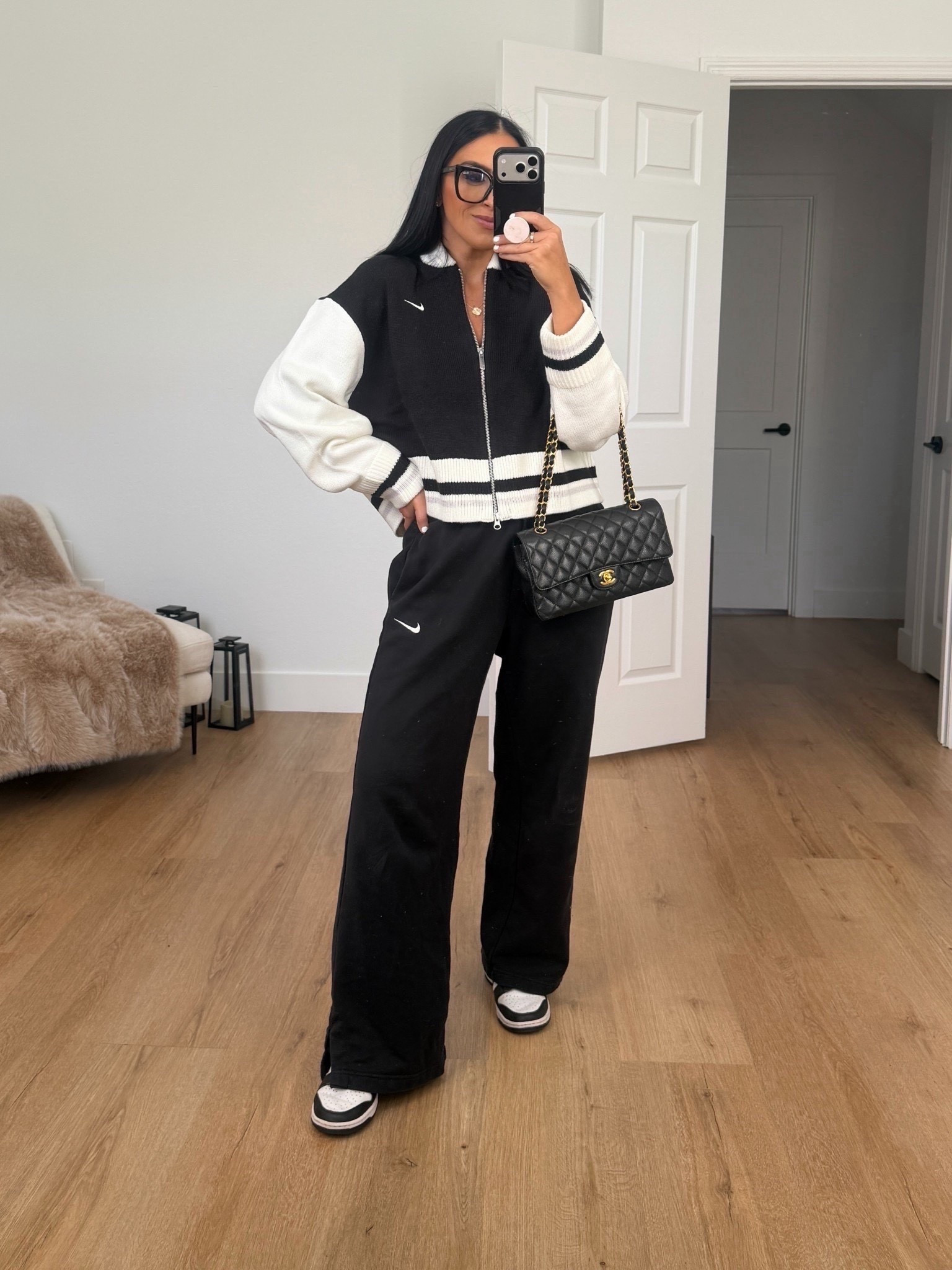 Nike Sportswear Women's Cardigan wearing size small. Nike Sportswear Phoenix Fleece Women's High-Waisted Wide-Leg Pants wearing size small. 