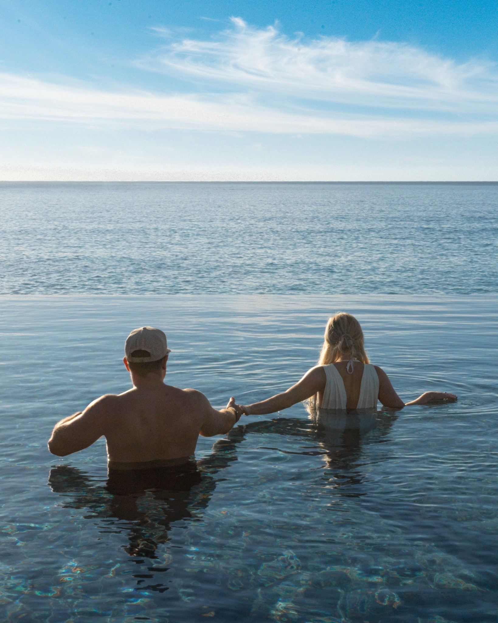 An easy Cabo poolside look for both of us 🤍 A timeless white one-piece styled with a flowy skirt cover-up & straw hat for her, paired with classic men’s swim trunks for him — effortless, elevated, and perfect for beach walks, pool days, and resort afternoons that turn into sunset drinks without changing. Cabo beach outfits couple, resort swimwear him and her, white one piece swimsuit, swim cover up skirt, men’s swim trunks outfit, poolside outfits couple, Cabo resort wear, tropical beach outfits, Mexico vacation style, beach vacation outfits couple

 

 

#LTKTravel #LTKMens #LTKWedding