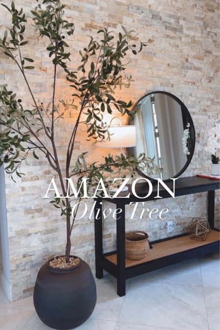 A great statement piece for your home 
Amazon olive tree 
The black vase size is the small one 



#LTKhome #LTKSeasonal #LTKU