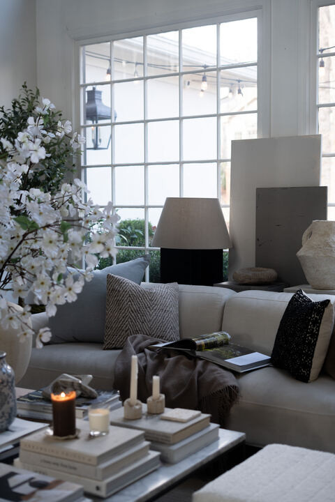 OMG I am so drawn to this look. The layered neutrals with hints of soft blue make everything feel airy and intentional. Between the florals, candles, and textured pillows, it feels peaceful and elevated. EEK this is timeless home design at its best.  

 #LTKSpringSale #LTKSeasonal #LTKHome