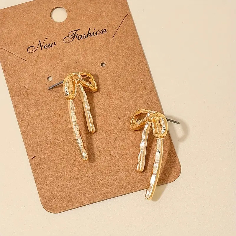Exquisite Hollow Bow Design Dangle Earrings Elegant Simple - Temu | Temu Affiliate Program