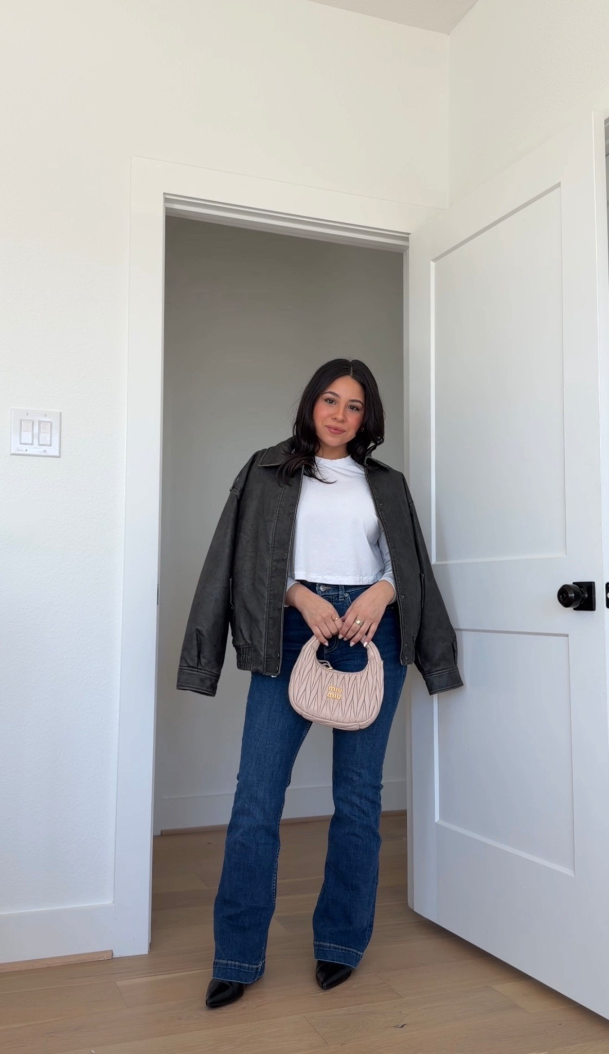 Flare bootcut jeans: small petite 
White long sleeve: small 
Faux leather jacket: small petite 
Black boots: 6.5 

#LTKPetite #LTKootd #LTKgrwm