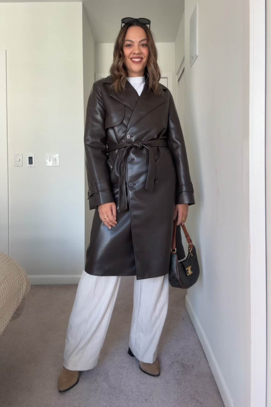 Fall outfit idea!
-Aritzia chocolate brown faux leather trenchcoat, I have a size medium.
-Aritzia beige high-rise wide leg trousers, I have a size 10.
-Uniqlo white T-shirt, I have a size large.
-Celine Triomphe Ava bag in canvas.
-Celine Triomphe sunglasses. 
-Suede ankle boots, similar linked.


#LTKautumn #LTKstyletip #LTKcanada