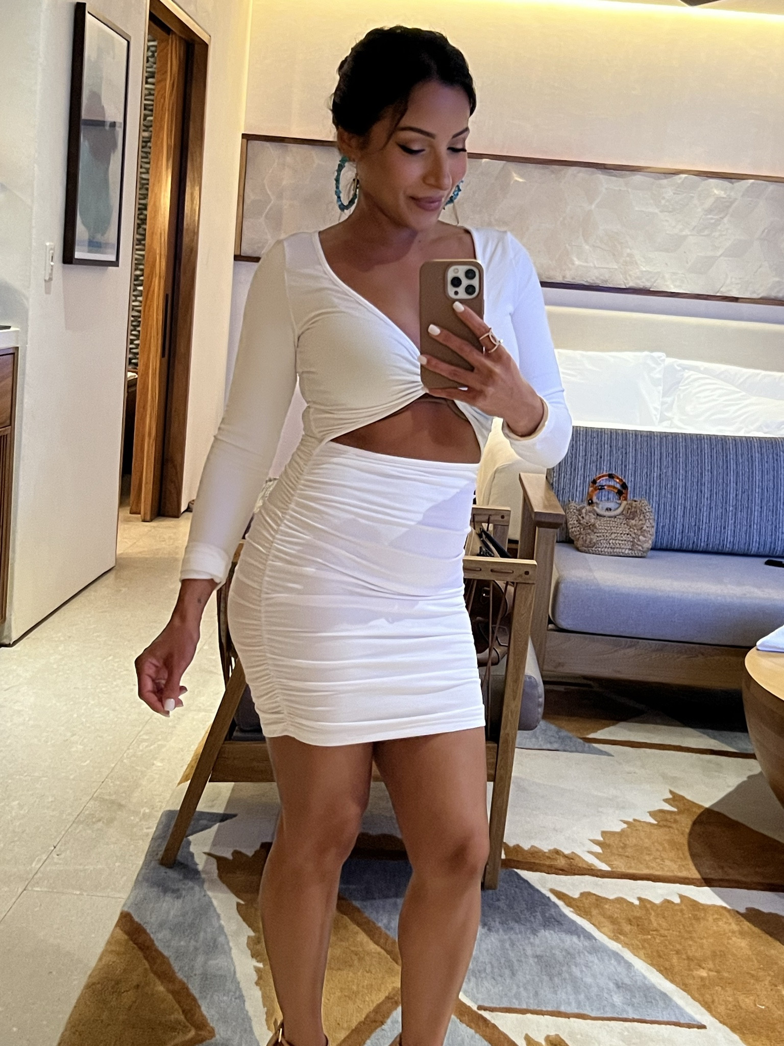 Embrace summer nights in style with this alluring white cut-out dress! 💃✨ Whether you choose fiery red, classic black, or another stunning shade, these long sleeves are your ticket to sultry sophistication on those breezy summer evenings. Let the dress steal the spotlight by pairing it with nude or clear heels or sandals. Elevate your look and turn heads wherever you go! #SummerNights #ChicStyle #FashionForward #clubwear #clubdress #styleessentials #sexydress

#LTKparties #LTKstyletip #LTKU