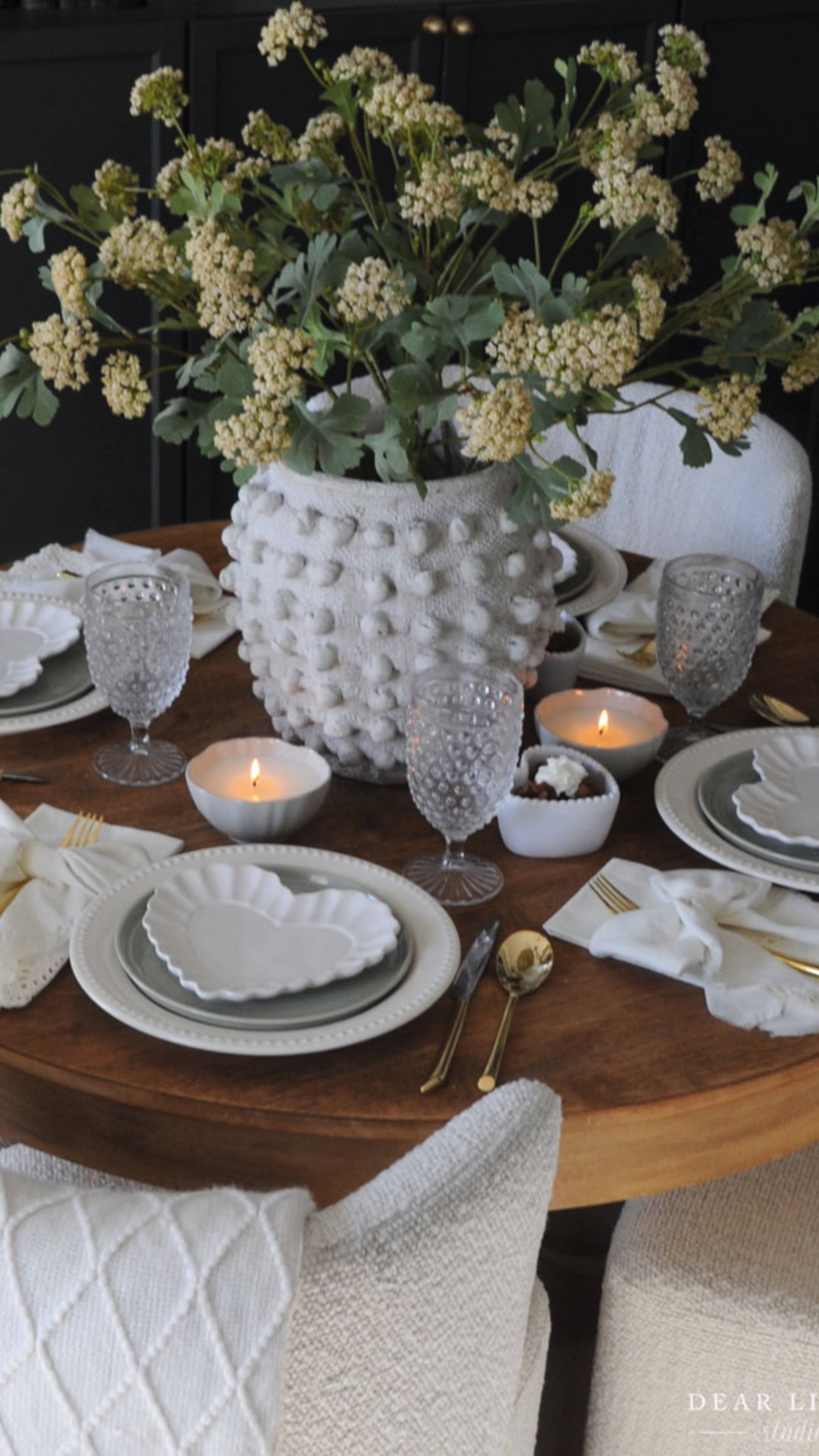 Fold your napkin into a bow! 

#LTKSeasonal #LTKHome #LTKWatchNow