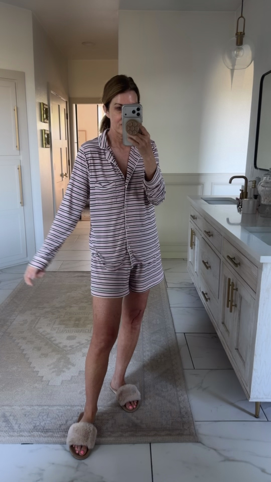 Wearing a size medium top and size medium bottom. Suggest getting your true size. These pjs rub a bit oversized. Currently 40% off at checkout

#LTKSaleAlert #LTKOver40