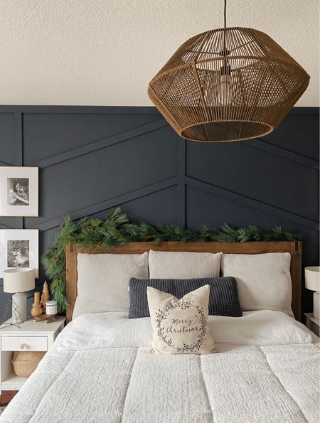 Bedroom decor- navy blue wall, won’t a brown rattan pendant light. Wooden bed with white bedding and some cute white nightstands to compliment. #christmasdecor #bedroomdesign #bedroomdecor #christmas #christmasbedroom 

#LTKSeasonal #LTKHoliday #LTKhome