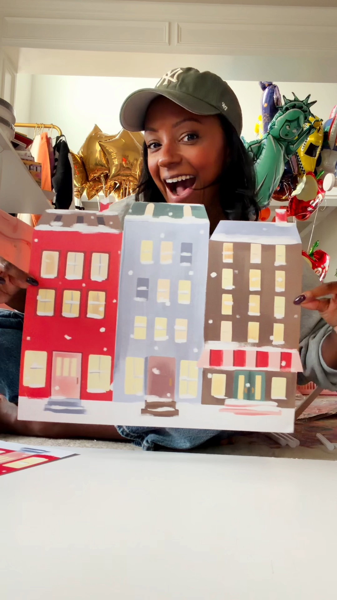 Here’s how I created our DIY Thanksgiving Day Parade backdrop using our City Sidewalks placemats with My Mind’s Eye.

1. Trace the City Sidewalks placemats onto foam poster board and cut out the cityscape shape.
2. Line up the placemats with the shapes and glue the placemats to the board.
3. Hot glue floral foam along the bottom edge of the foam for stability.
4. Insert balloon sticks with your favorite character balloons into the floral foam.
5. Repeat as needed to fit your table!