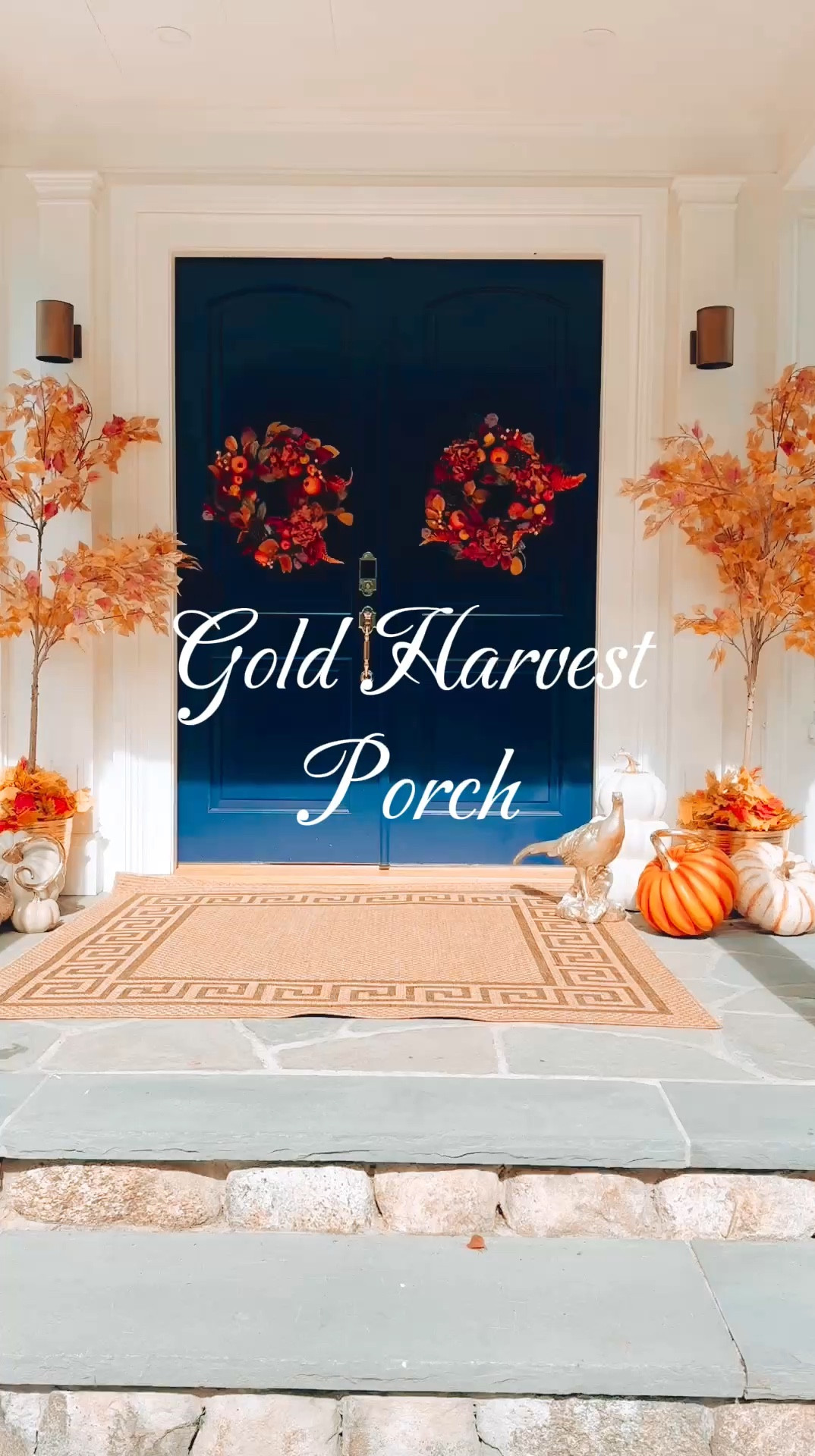 Picture this, loves: an entrance that feels like stepping into a scene from a gilded autumn dream. A soft beige carpet lays the groundwork, catching every little leaf before it prances indoors—practical yet oh-so-chic. On either side of the door, two stunning faux birch trees rise in glimmering gold planters, standing tall and proud with that irresistible touch of glam.
Then, scattered here and there like autumn jewels, I’ve placed resin pumpkins and charmingly quirky gourds. They’re the kind that look as if they tumbled right out of a fairytale, each one irregular and unique, hinting at Cinderella’s pumpkin. And the crowning jewel? A golden pheasant sits in all its splendor, adding a wink of high-society charm.
Finally, framing the door are twin wreaths adorned with rich pomegranates and apples, simple yet luxuriously lush, creating an entrance that’s equal parts refined and welcoming. It’s autumn with a side of elegance, all set to welcome guests in style.

#LTKHoliday #LTKSeasonal #LTKVideo