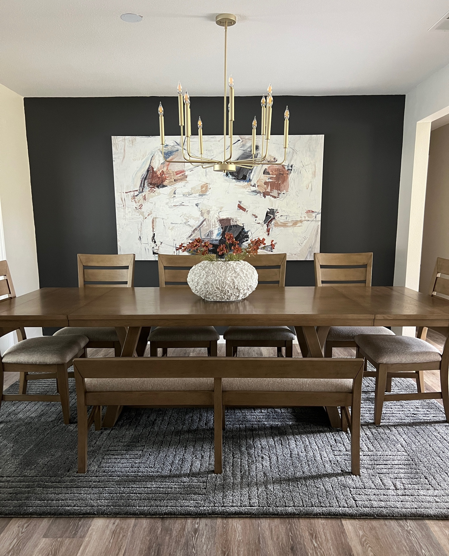 Linking the light from Amazon! That is all I’m able to link through like to know it. You can check out my dining room highlights on Instagram for other links. The art canvas and vase are from HomeGoods and the flowers are from Hobby lobby. The dining set and rug are from Furniture Row . The dark paint color is peppercorn by Sherwin-Williams lightened by 50%

#LTKHome