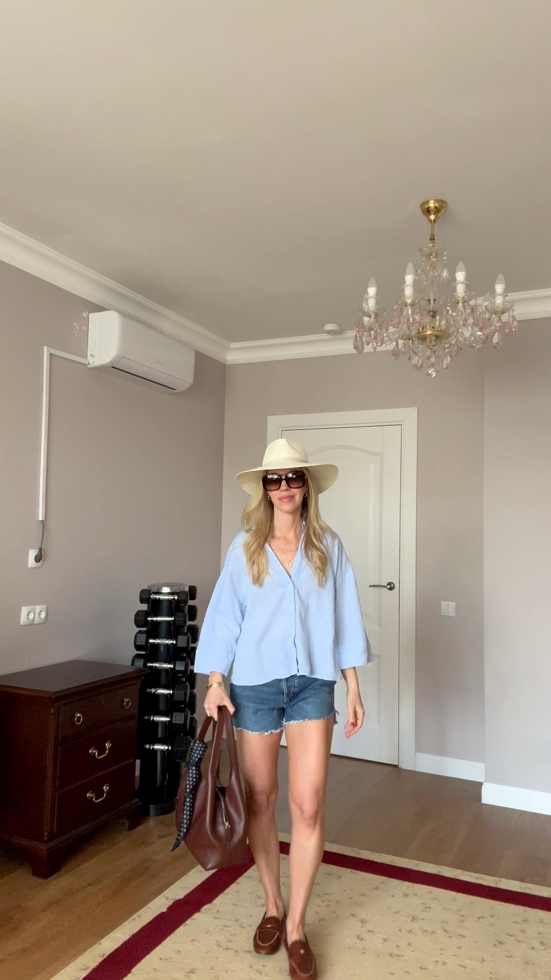 Casual summer outfit, blue linen shirt, denim cutoff shorts, @Zara leather loafers, @Janessa Leone straw hat

#LTKTravel #LTKOver40 #LTKSeasonal