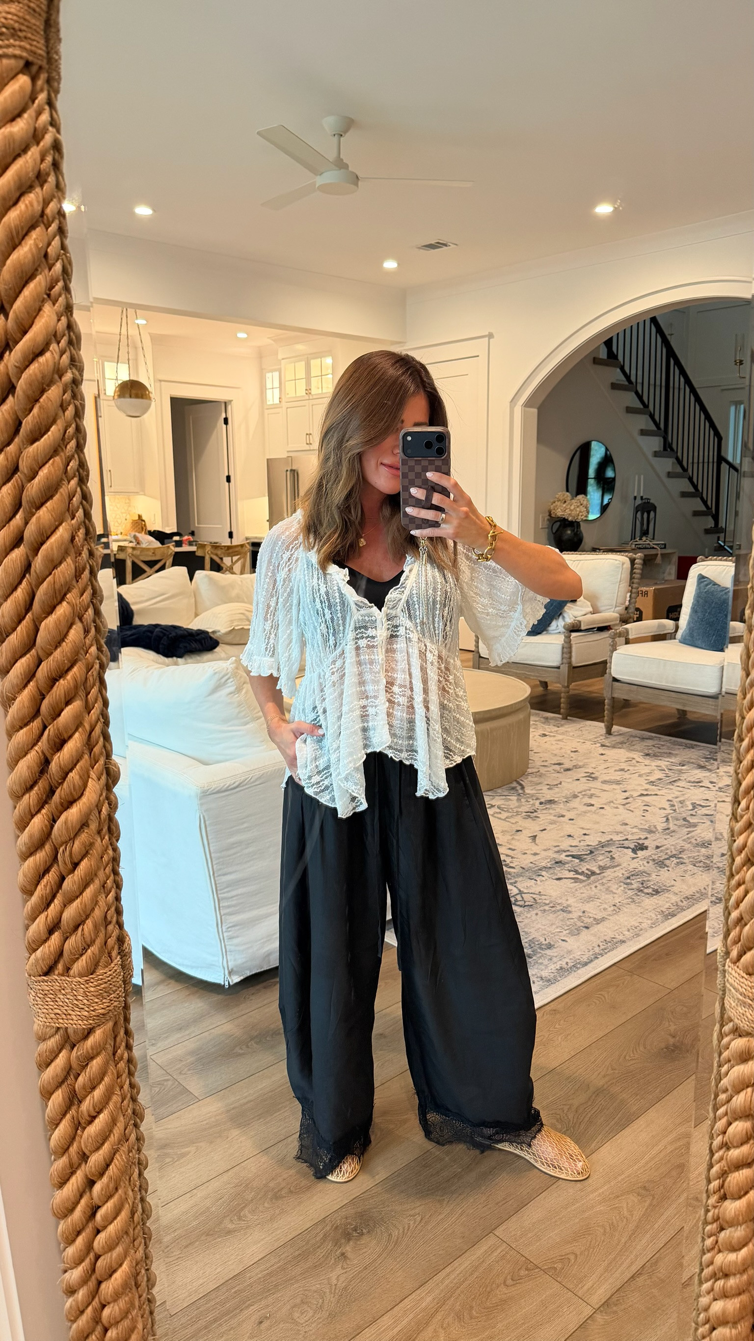 An effortless boho-inspired look with flowy black lace-trim pants, a sheer white lace top, and woven flats.

boho outfit, lace top, black pants, wide leg pants, flowy pants, sheer blouse, lace trim pants, woven flats, neutral outfit, casual chic, bohemian style, relaxed outfit, transitional outfit, early fall style, everyday outfit, feminine style, effortless style, weekend outfit, casual fall outfit, boho chic outfit 

 #LTKootd #LTKPetite