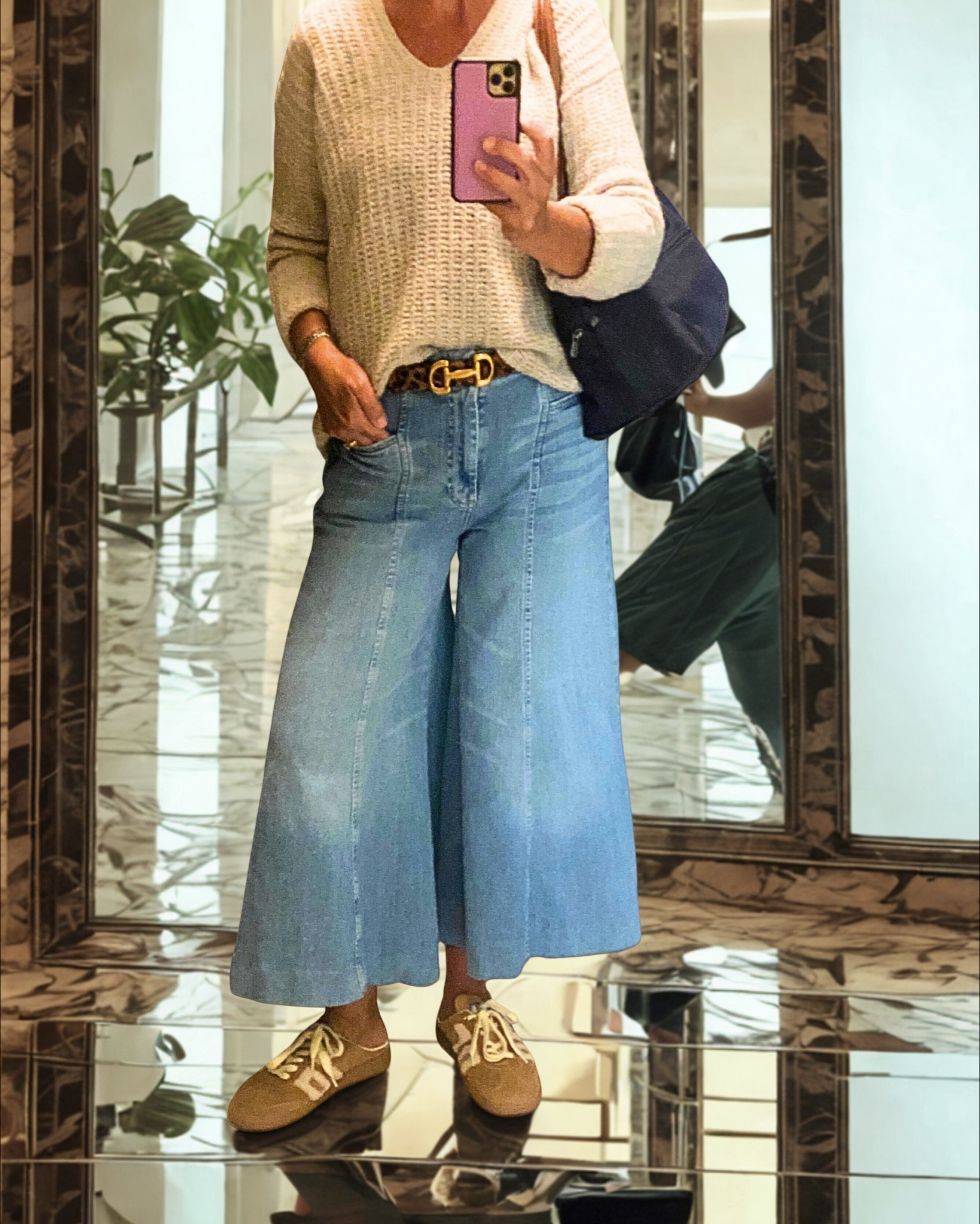 Sale Alert ‼️ My favorite new jeans, hit the sale rack at Anthropologie | $89.95! 

These jeans check every box on my fall/winter denim wish list: wide leg, fitted through the hip, and a comfortable mid-rise. I loved them so much I bought this pair at full price – and then they went on sale, lol! 

They pair perfectly with sneakers, flats, clogs, boots—even cowboy boots. If you’re a flare lover like me, these are worth a peek. I found them to run true to size. Styled here with the Boden Leopard Snaffle belt ( also now in espresso brown)  and Back 70 tan suede sneaker mules, also Anthropologie and linked below! 
*Cashmere oversized sweater | Vince (thrifted) | Tote is le pilage by Longchamp

#LTKShoeCrush #LTKSaleAlert #LTKOver40