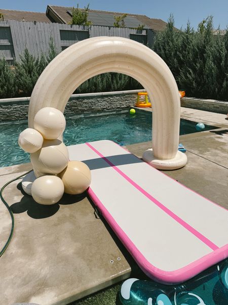 The only summer set up you need!! This rainbow arch is perfect for everything from parties, to pool days. 🌈 

#LTKFamily #LTKFindsUnder50 #LTKKids