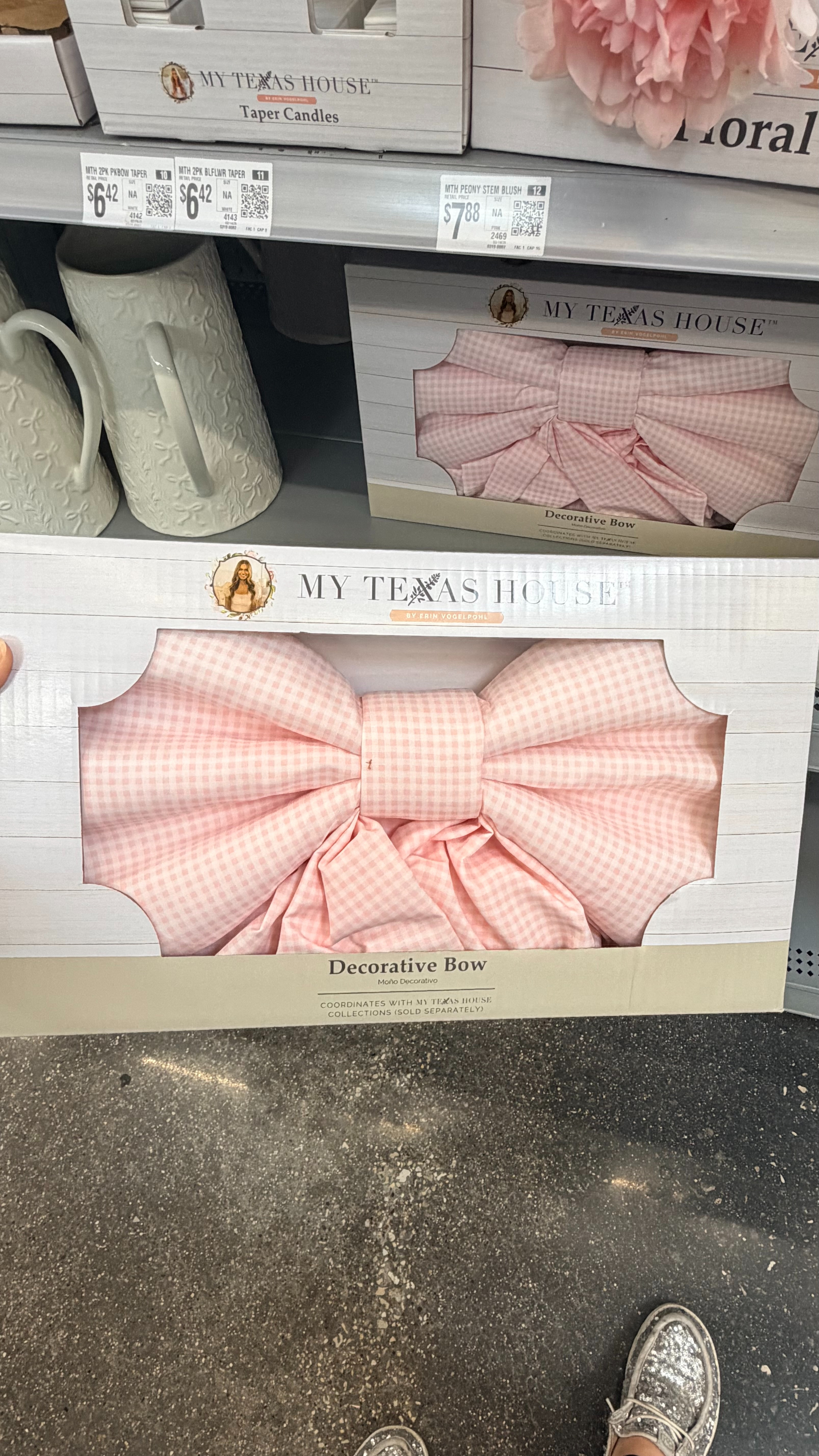 My Texas House Oversized Gingham Easter Bow adds a charming and elegant touch to your seasonal decor. This beautiful pink bow features a soft gingham pattern that captures the essence of spring and Easter style. Measuring 24 inches wide by 48 inches long, it’s the perfect size for accenting doors, wreaths, stair rails, or large gifts. The oversized design makes it a stunning statement piece that complements farmhouse and traditional decor alike. Add a fresh and festive finishing touch to your home with the My Texas House Oversized Gingham Easter Bow. 

 #LTKSeasonal #LTKHome