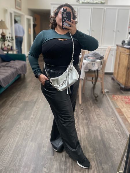 athleisure fit. Awesome way to go ti studio class without having to drag a coat, add a shrug. From Old Navy, over tank & biker shorts. Add vegan leather pants with a silver cross body bag. Thick black sneakers.

#LTKmidsize #LTKover40 #LTKfitness