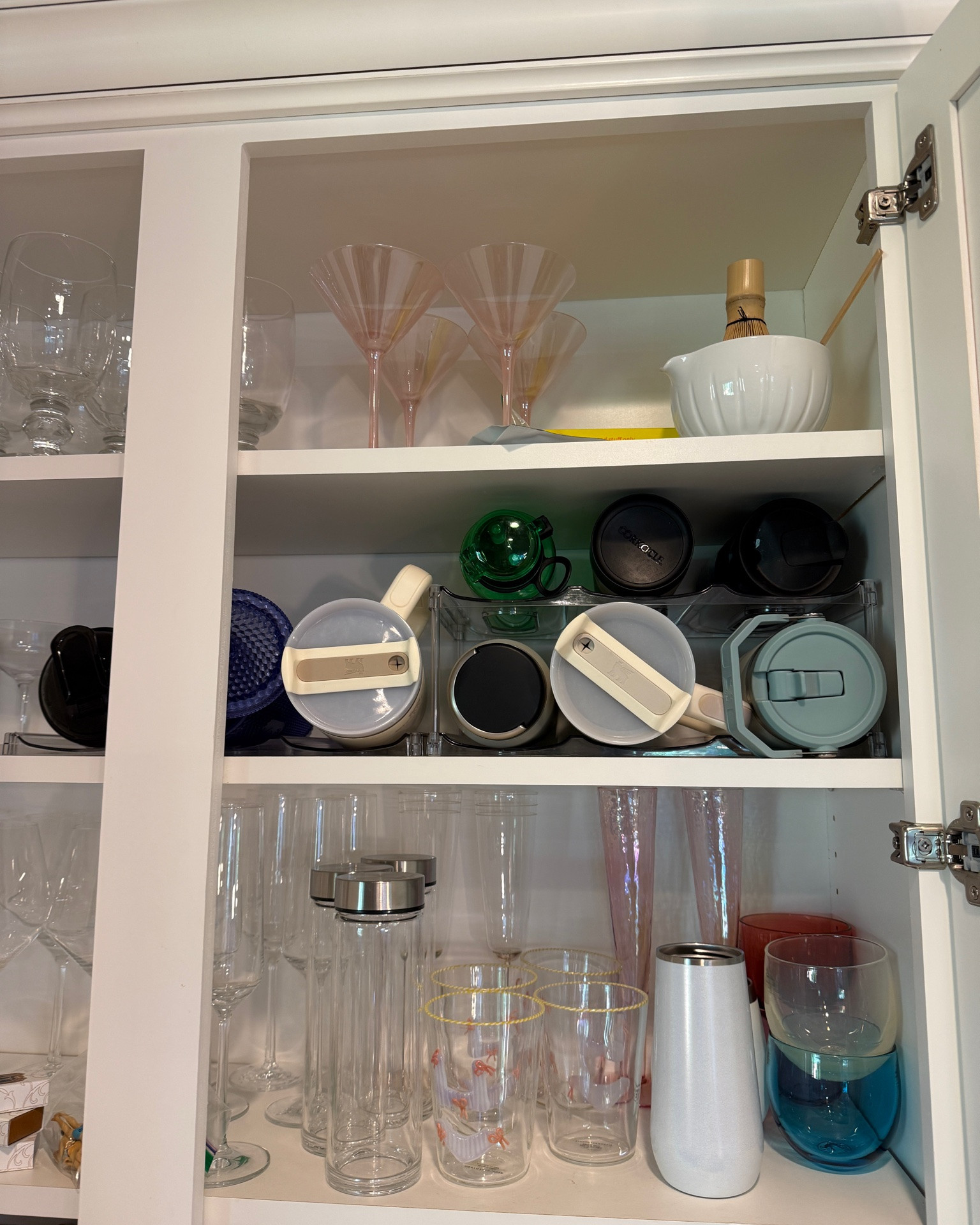 Raise your hand if your water bottle cabinet is a mess 🙋‍♀️ I bought this organizer and it looks so much better! Now they won’t fall out everytime I open the door lol. 

#amazon #home #hack #momhack #lifehack #organization #family #kitchen

#LTKdayinmylife #LTKmomlife #LTKHome