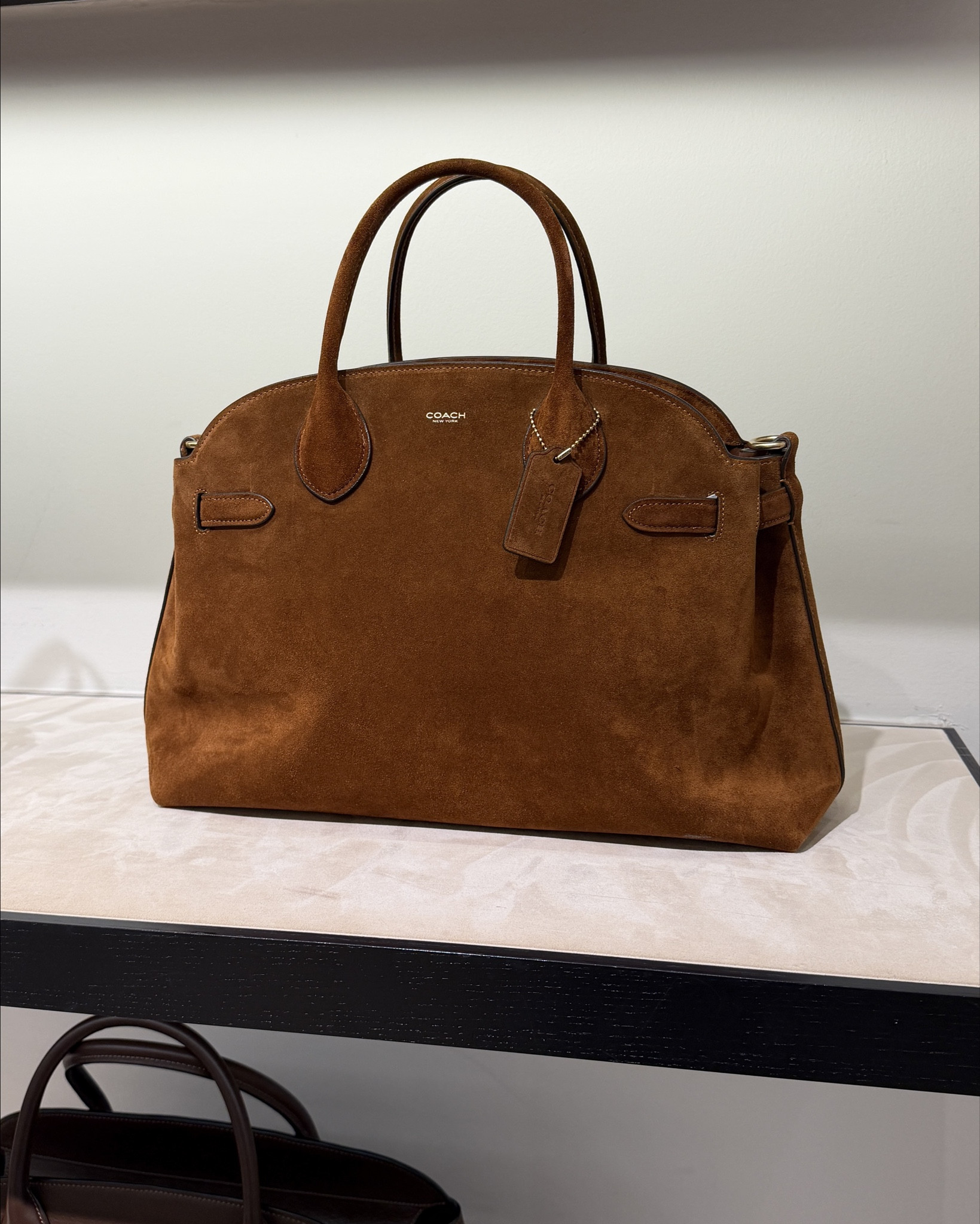 Some cute coach finds! I already have the empire 40 in Brown, but this cognac suede color is calling my name!