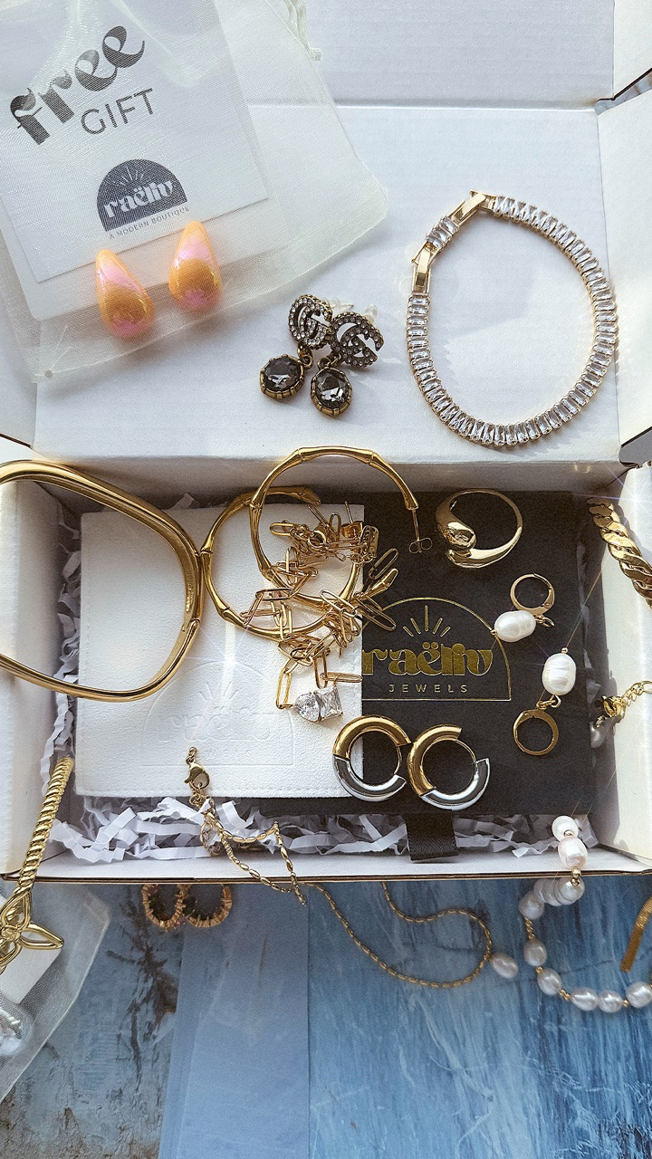 Discover the RAËLIV Surprise Box ✨ A curated jewelry mystery box filled with waterproof, tarnish free jewelry, bestselling styles, trendy earrings, necklaces, bracelets, rings, and exclusive extras. Perfect for gifting, treating yourself, or building your everyday jewelry collection for less. Limited quantity surprise jewelry boxes available now 🤍

#LTKselfcare #LTKdayinmylife #LTKgrwm