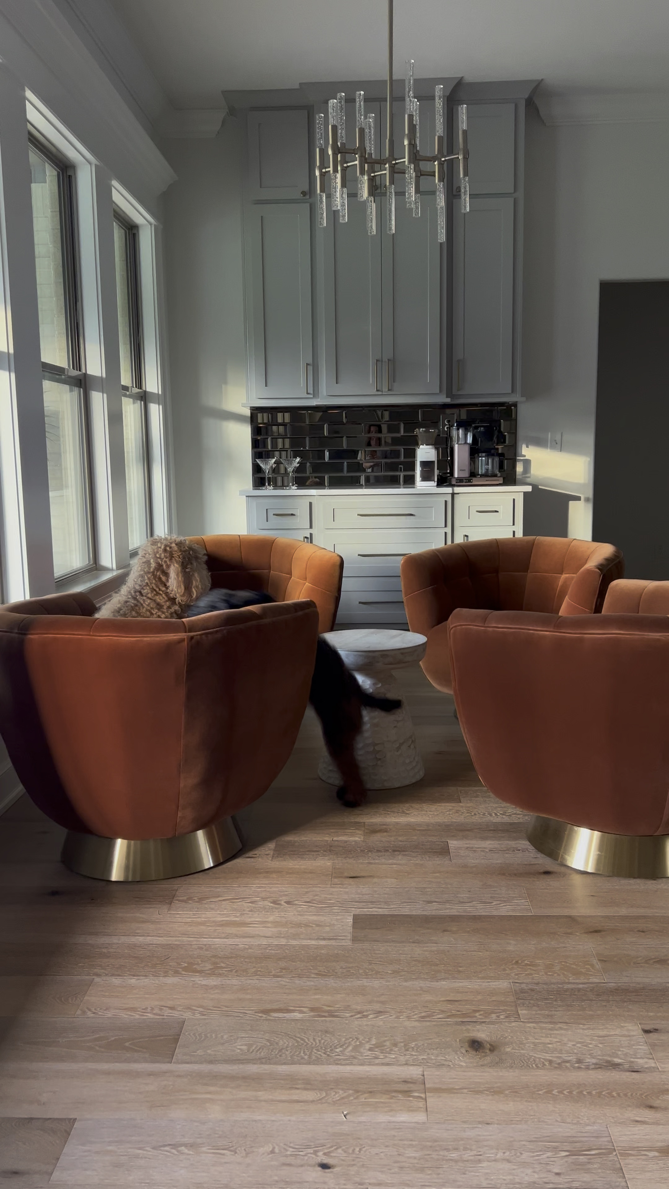 Cozy little corner. Instead of a traditional breakfast area, I wanted to create a casual, conversational, relaxed feel for this space. A sort of bar meets cocktail lounge vibe where it’s always happy hour. 

Kitchen, home interiors, seating area, accent chairs, chandelier 

#LTKhome