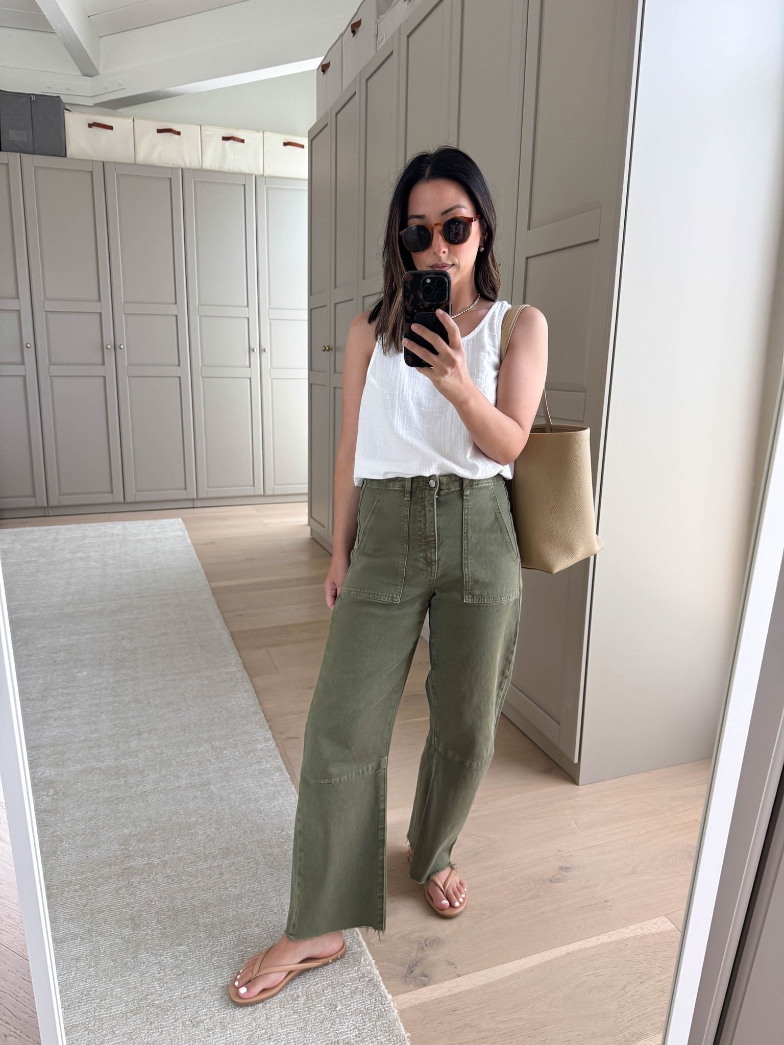 The perfect loose tank you've been looking for. And these slight barrels are so flattering! 

Gap gauze tank small 
Le Jean barrels 25 
Beek sandals 5 
The Row n/s tote medium 
Dorsey James necklace 15” 
Electric Picks earrings 
Le specs sunglasses

#LTKmomlife #LTKPetite #LTKootd