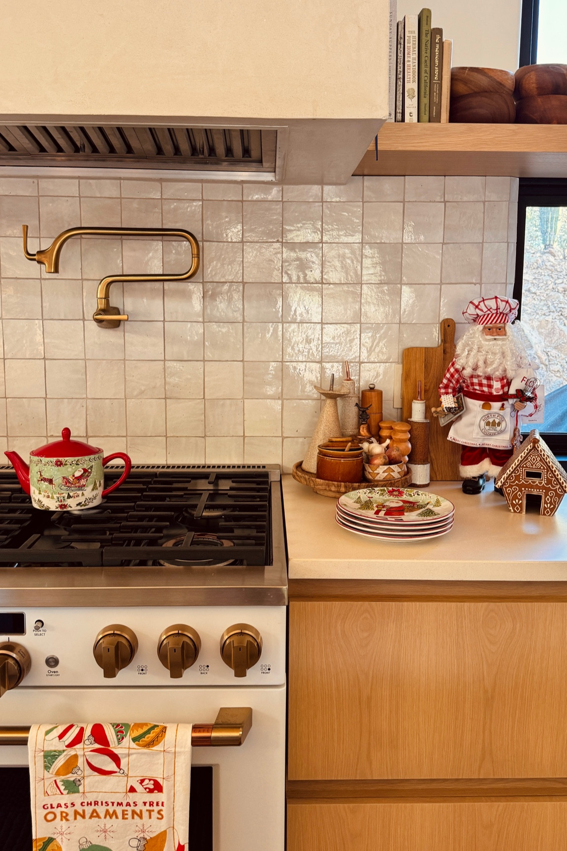 Kitchen Christmas favorites. Love this cute baking Santa doll for the countertop and festive teapot! 

#LTKHoliday #LTKFindsUnder100 #LTKSeasonal