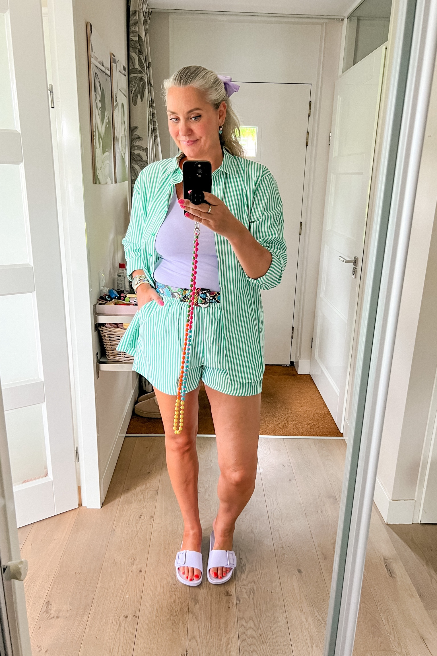 Ootd - Sunday. A green striped tall matching co-ord set of shorts and shirt. Paired with a lilac tank top and sandals and snakeskin print belt. 

#LTKnederlands #LTKeurope #LTKsummer