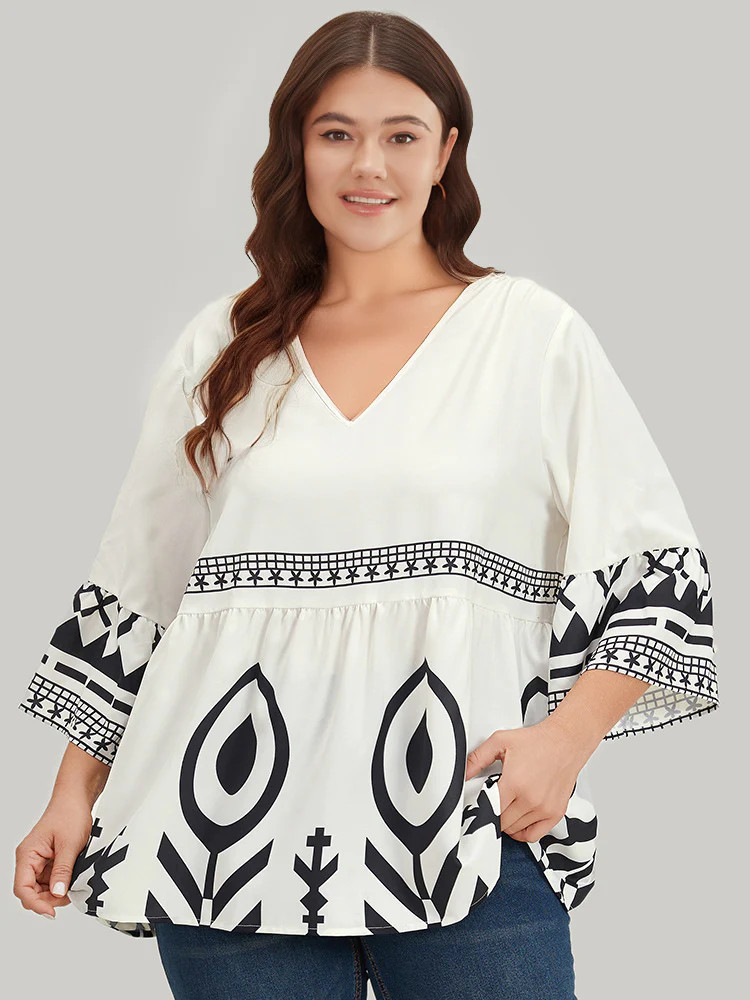 Silhouette Floral Print Bell Sleeve Ruffle Hem Blouse | Bloomchic