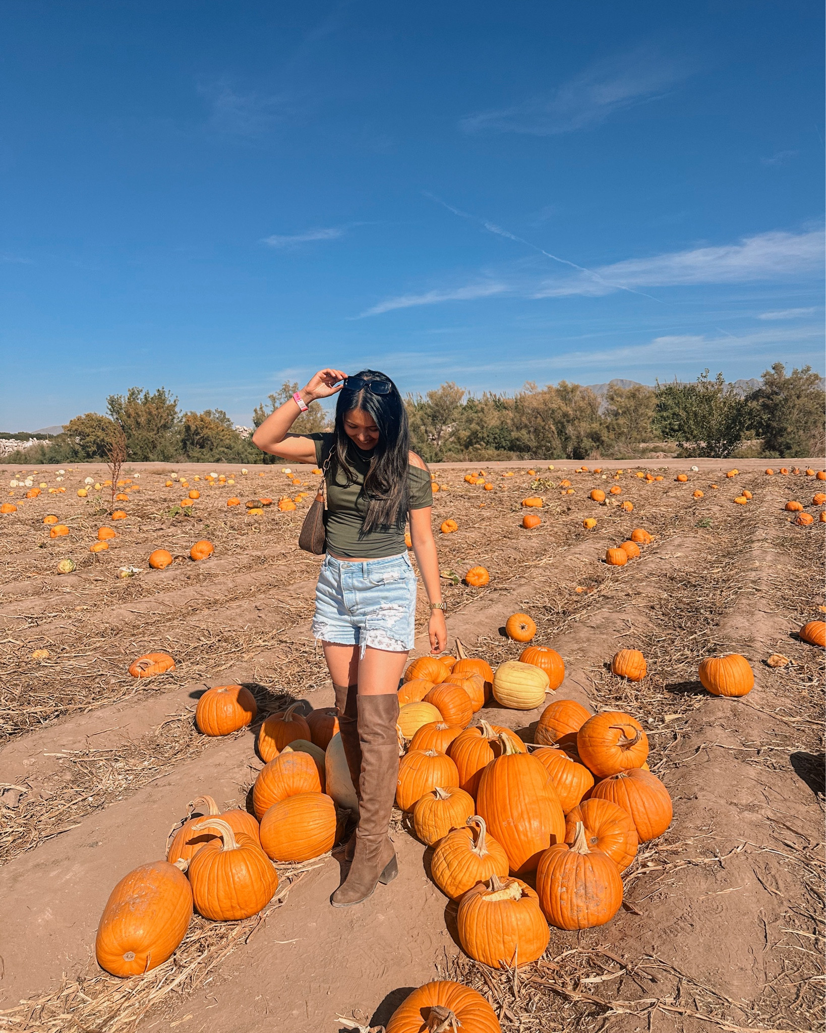 Had to post this before we hit December! This is a fall outfit, perfect for the pumpkin patch. Love the fall vibes 🧡 green off the shoulder top, denim shorts, and brown thigh high boots 

#LTKCyberWeek #LTKSaleAlert #LTKSeasonal