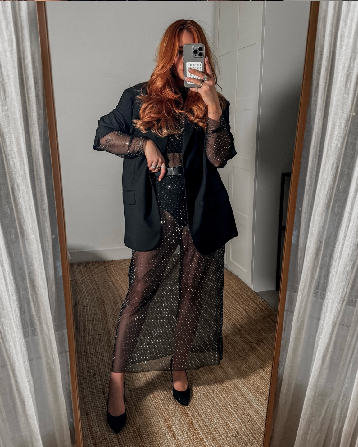 Festive 

Sparkly dress,  black blazer, black pointed heels , copper hair 