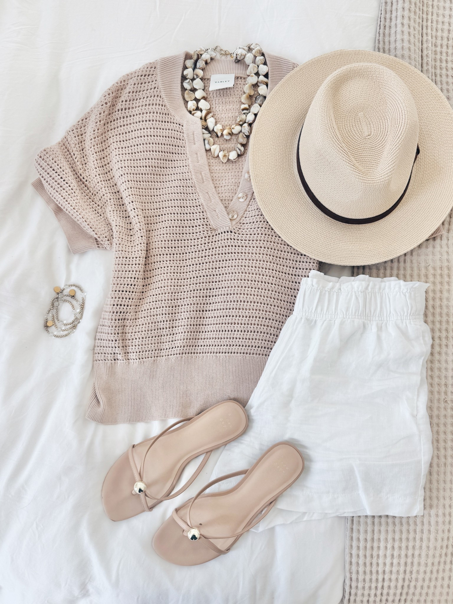 Just grabbed this top in another color this season. These knit tops are a go to for me! Hat is Amazon and fits my big head 😆

Linking similar sandals and shorts that I own. These are last season 

#LTKSeasonal #LTKTravel #LTKootd